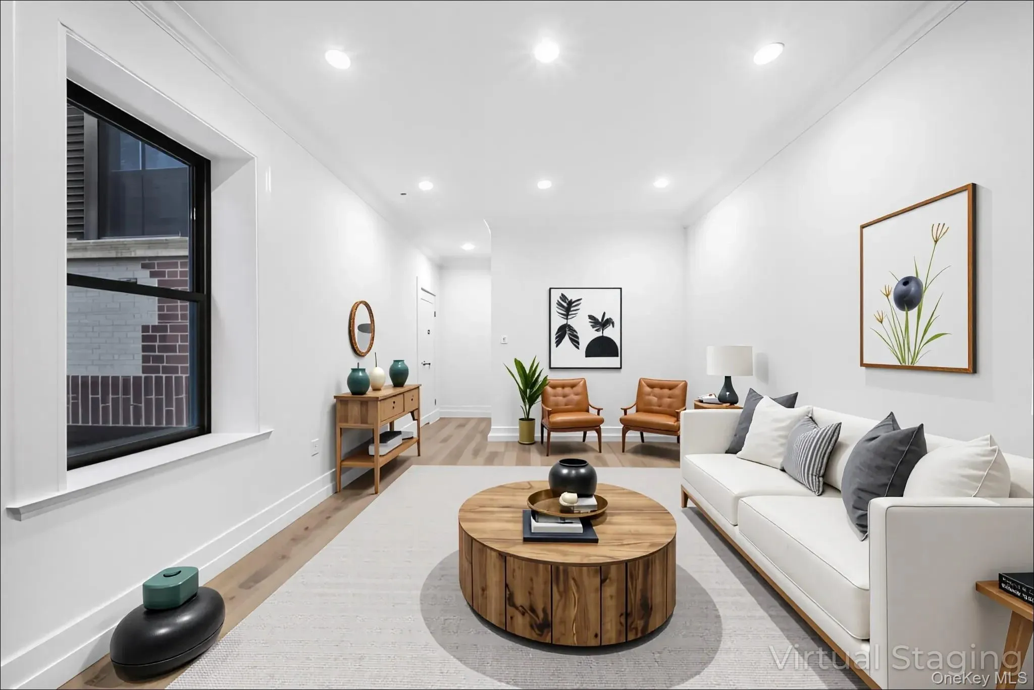 Living area with recessed lighting, light wood-type flooring, and crown molding Living area with recessed lighting, light wood-type flooring, and crown molding