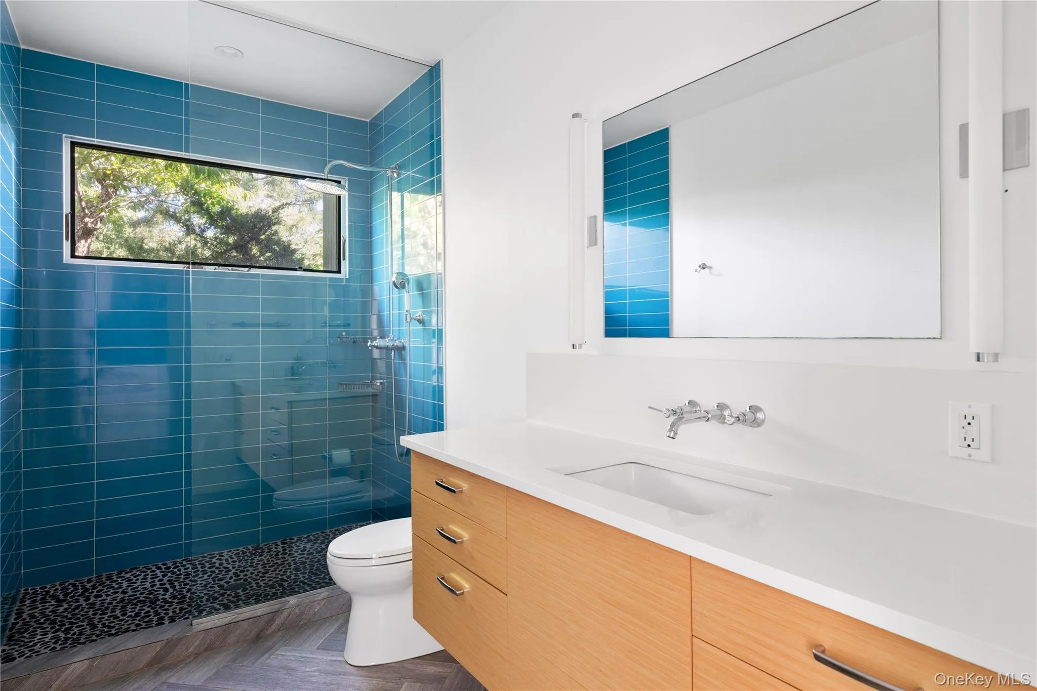 Full bath featuring vanity and a stall shower Full bath featuring vanity and a stall shower