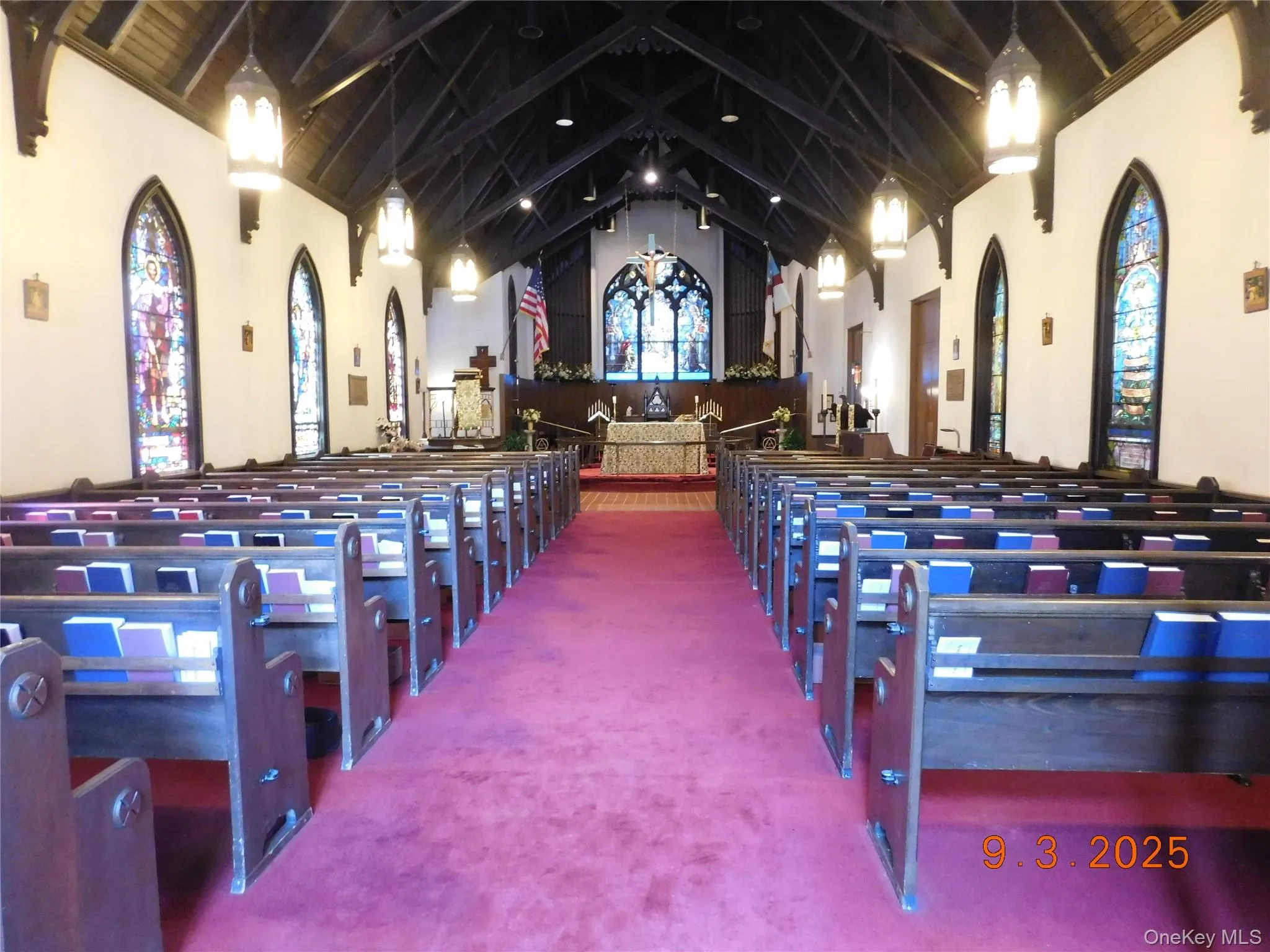 Misc room with carpet, high vaulted ceiling, and beamed ceiling Misc room with carpet, high vaulted ceiling, and beamed ceiling