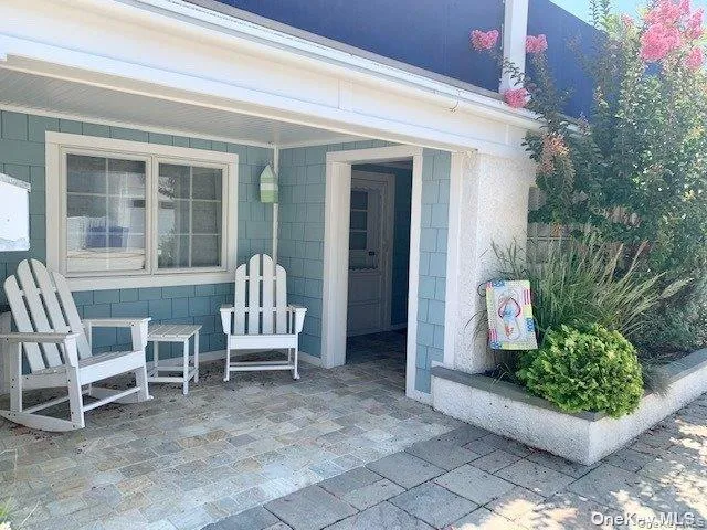 Property entrance with a patio area Property entrance with a patio area
