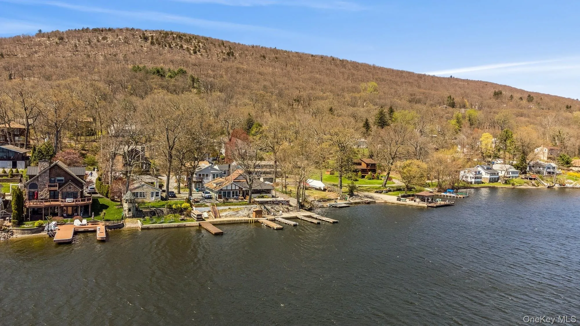 Drone / aerial view of a water and mountain view Drone / aerial view of a water and mountain view
