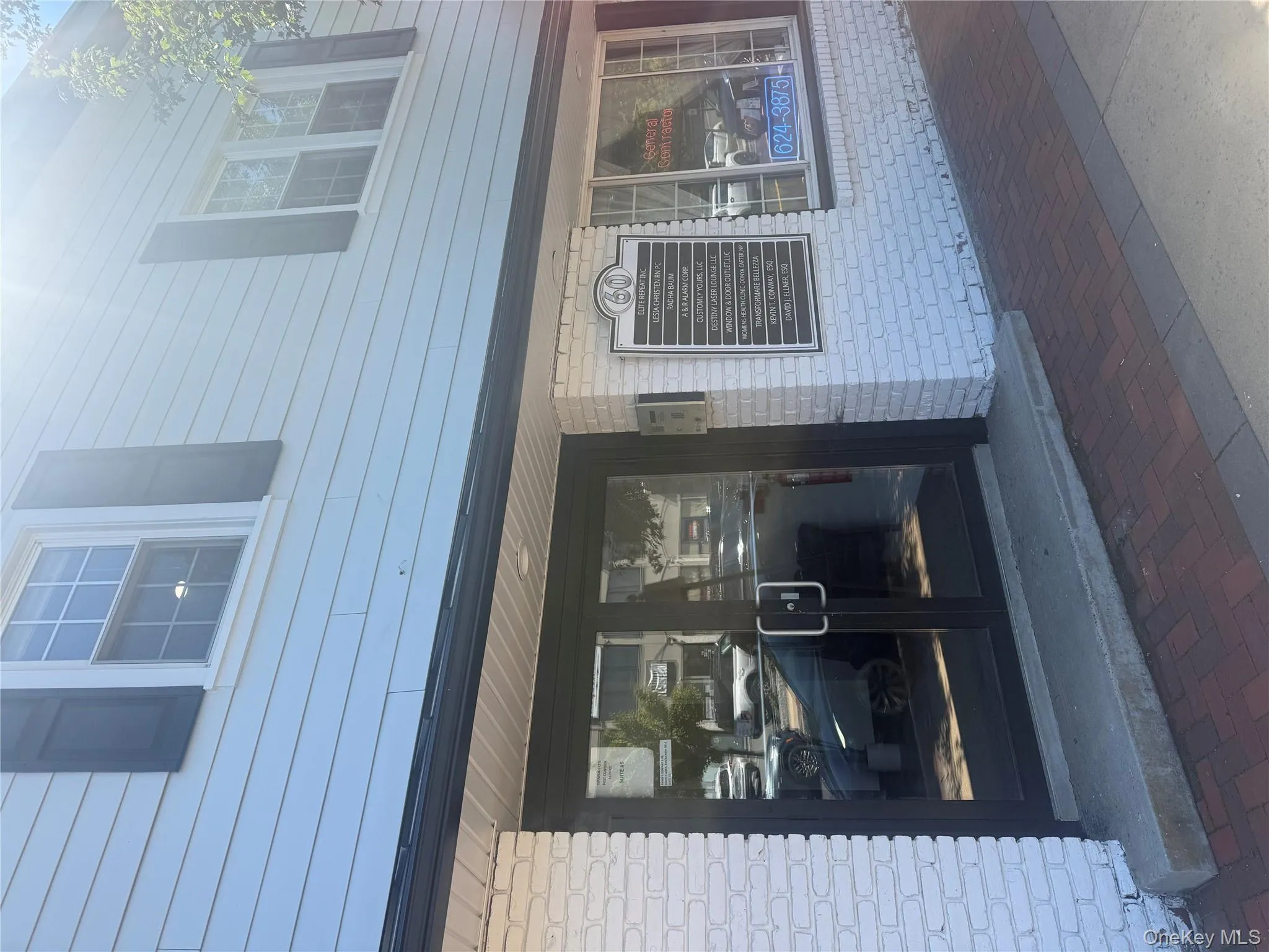 Entrance to property featuring brick siding Entrance to property featuring brick siding
