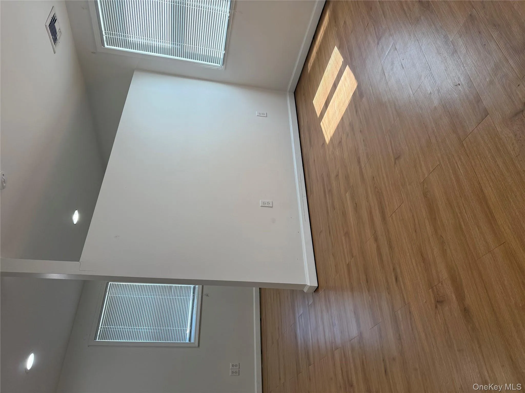 Unfurnished room featuring light wood-type flooring and recessed lighting Unfurnished room featuring light wood-type flooring and recessed lighting