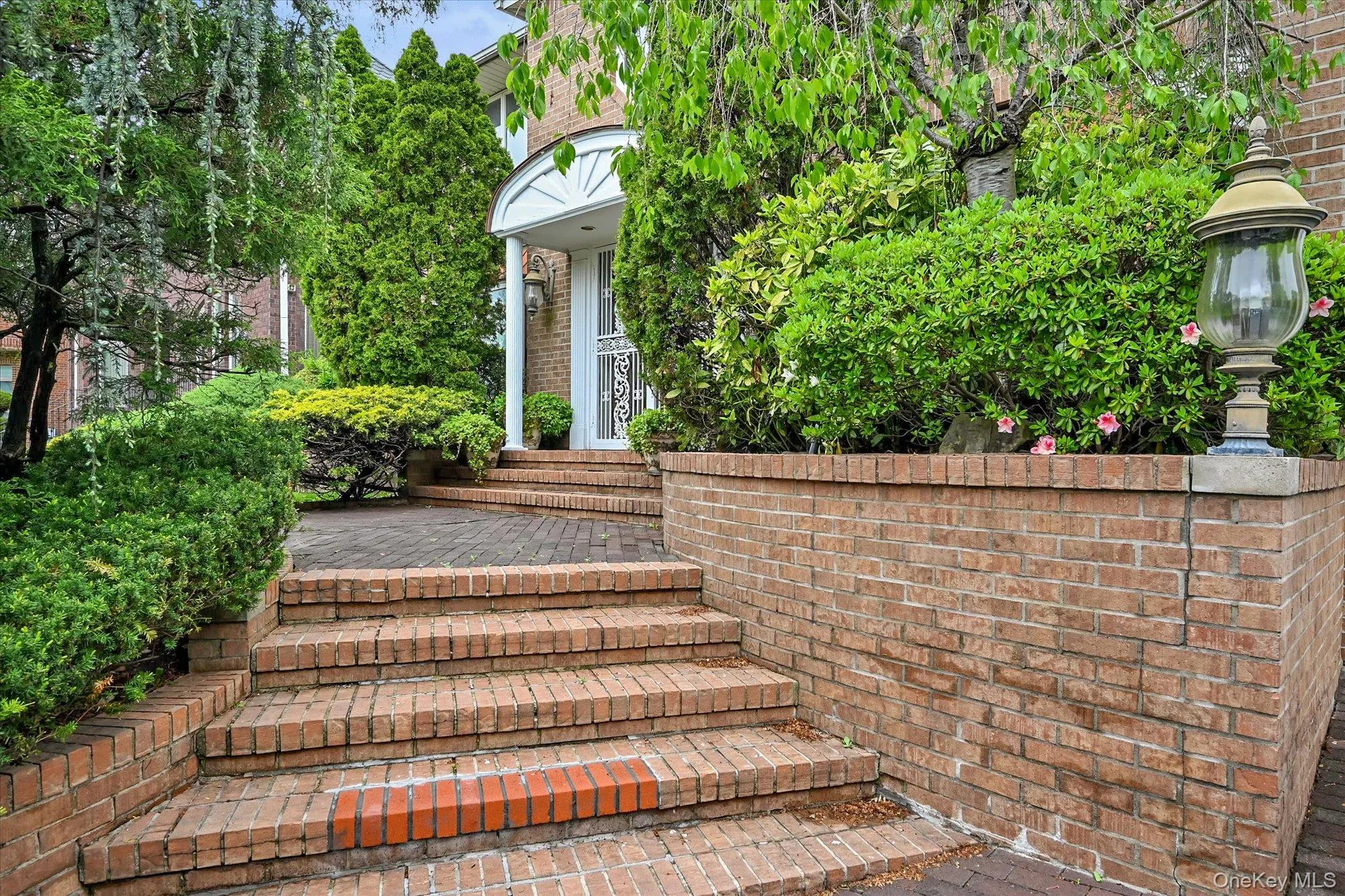 Entrance to property with brick siding Entrance to property with brick siding