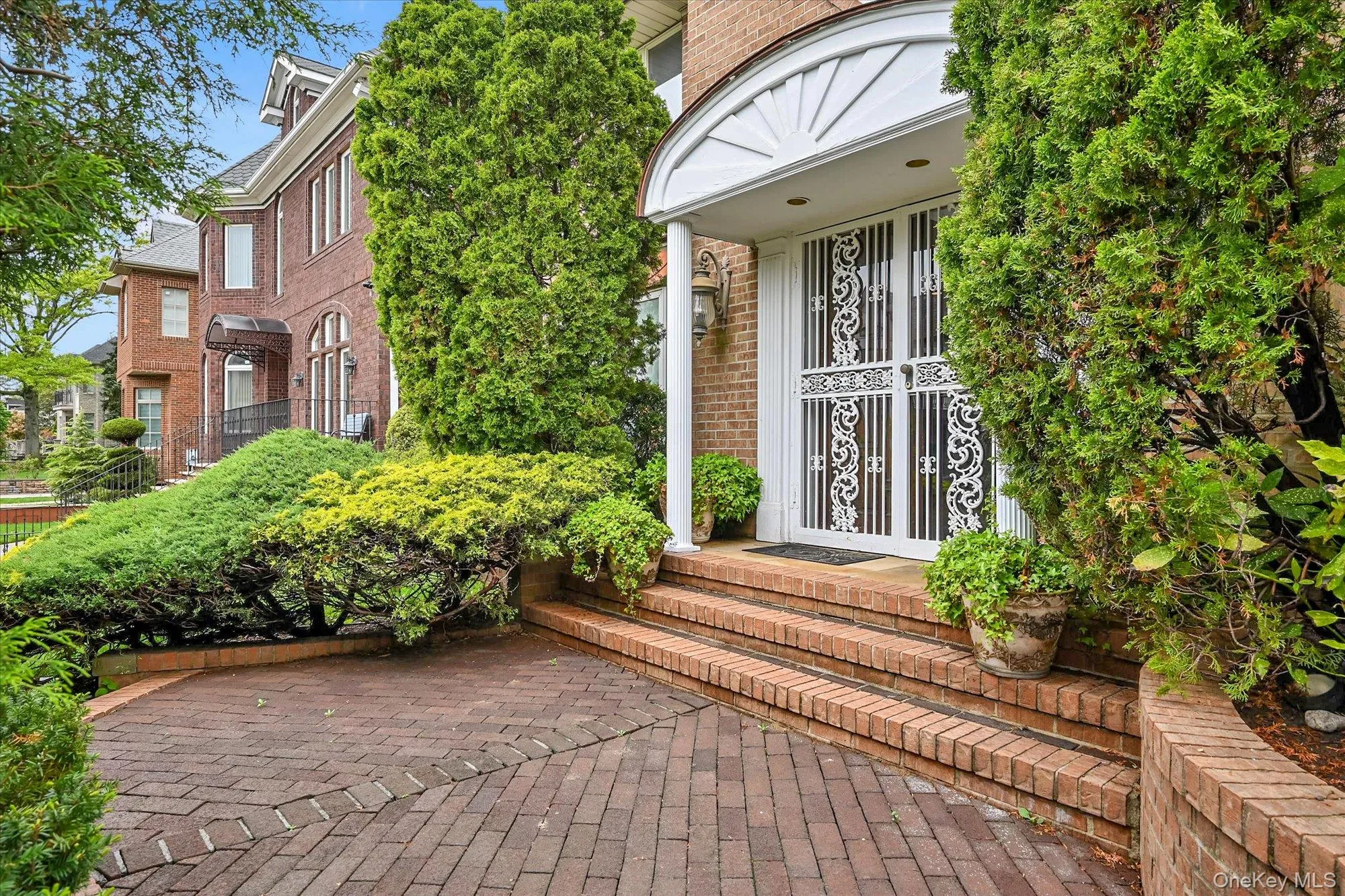 Entrance to property featuring brick siding Entrance to property featuring brick siding