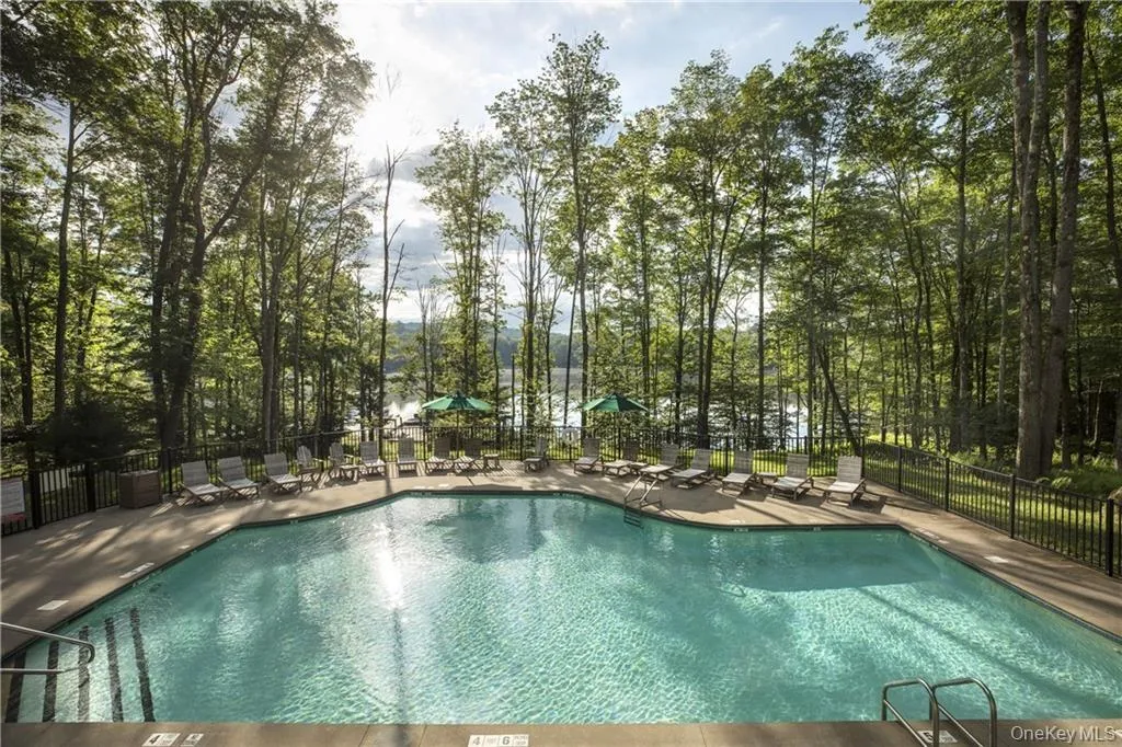 Community pool featuring a patio Community pool featuring a patio