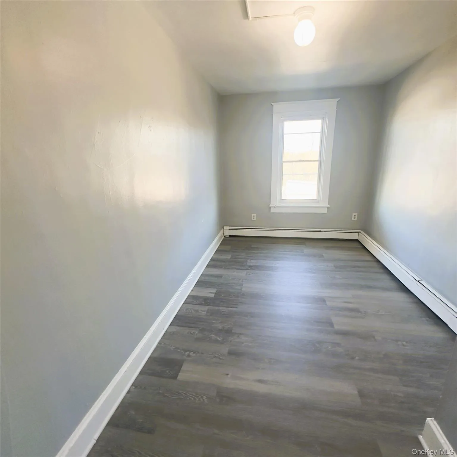 Vinyl flooring, baseboard heating, light fixture, closet. Vinyl flooring, baseboard heating, light fixture, closet.
