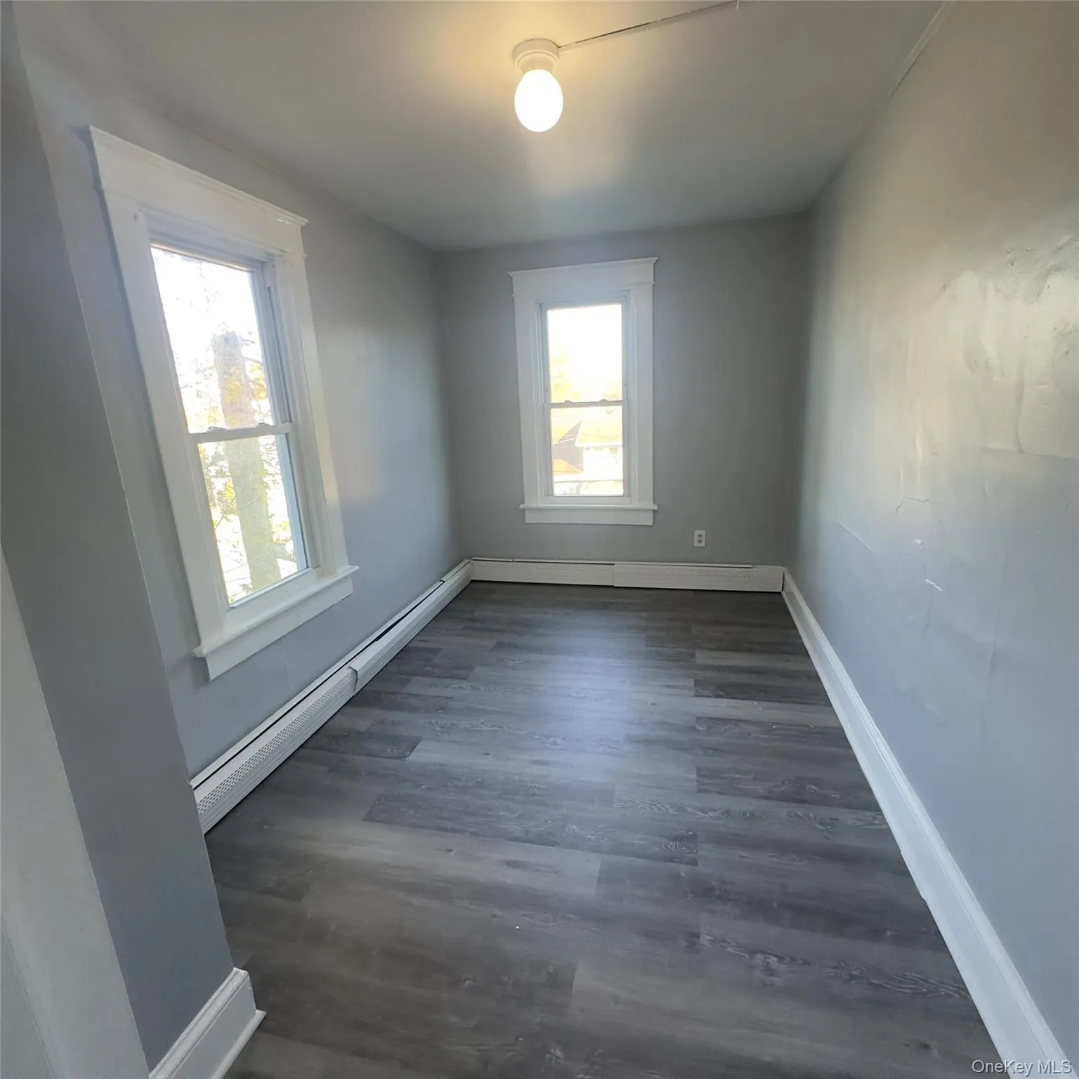Vinyl flooring, baseboard heating, light fixture, closet. Vinyl flooring, baseboard heating, light fixture, closet.