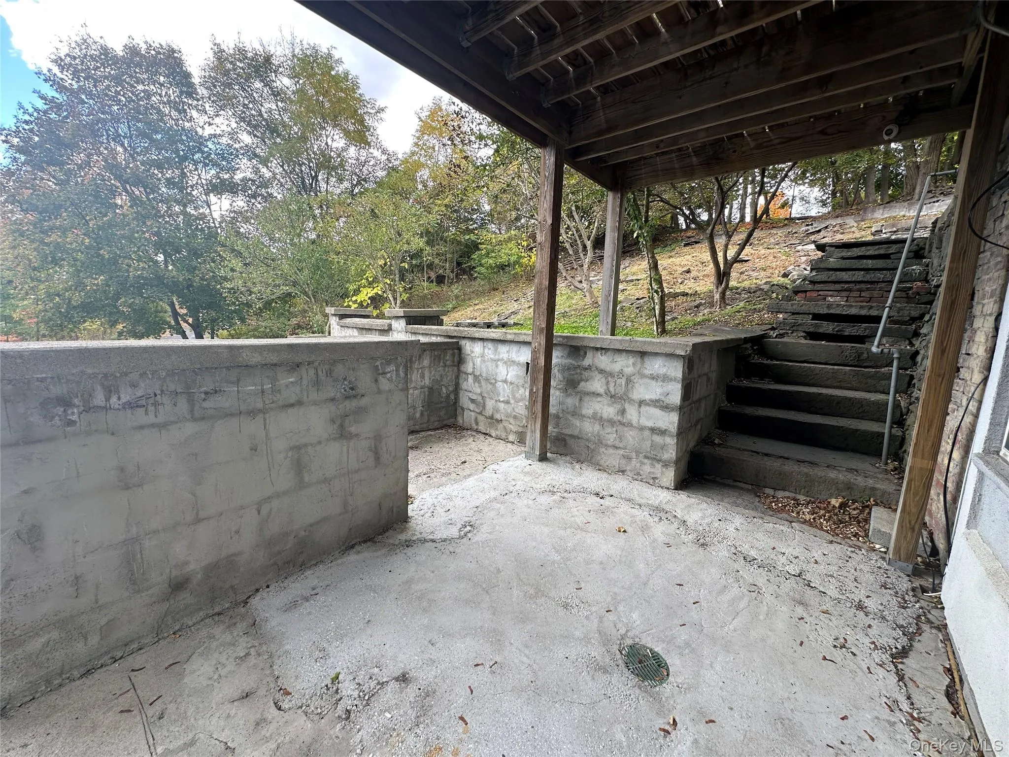 View of patio / terrace featuring stairway View of patio / terrace featuring stairway