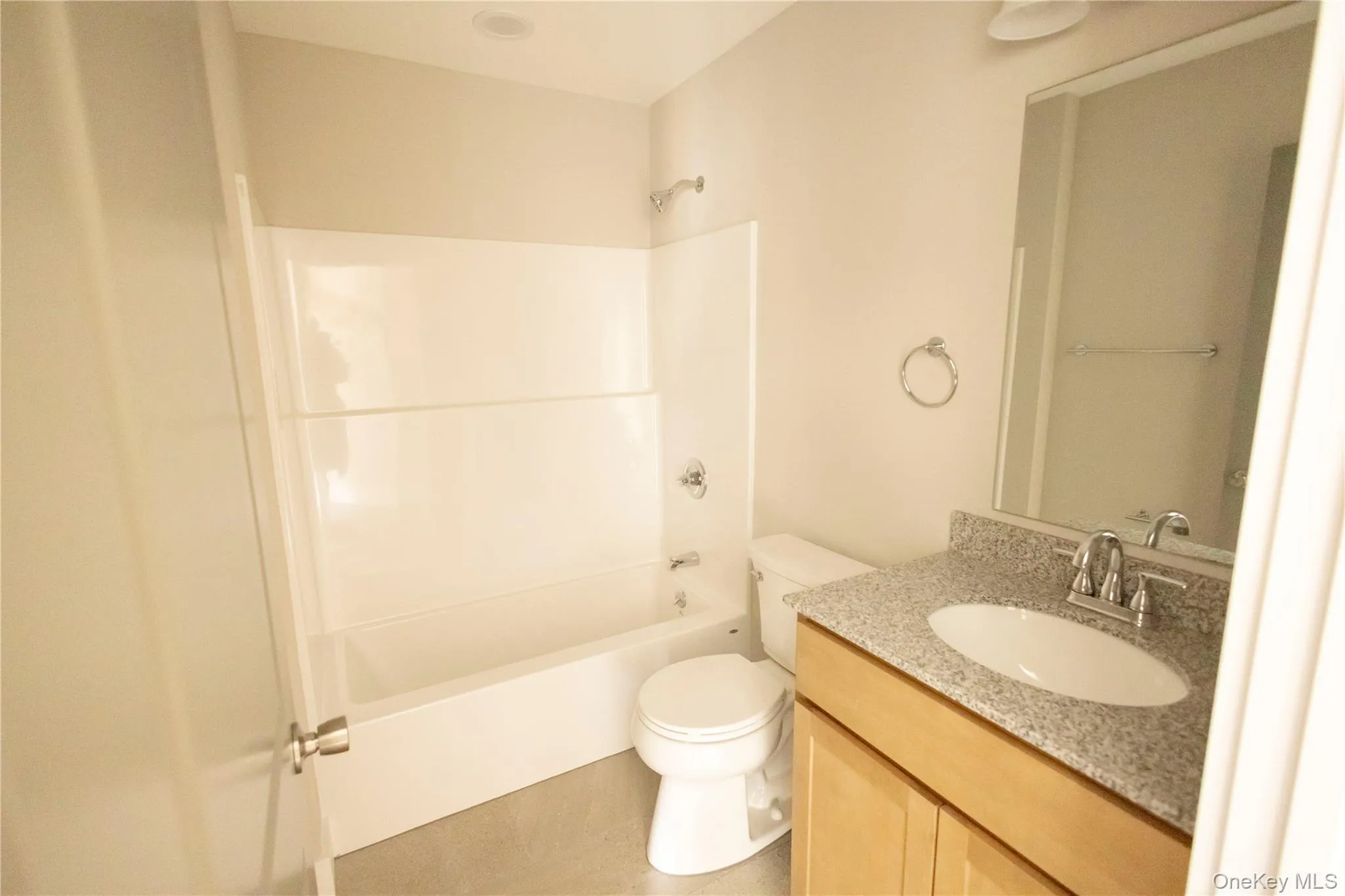 Full bathroom with vanity and tub / shower combination Full bathroom with vanity and tub / shower combination