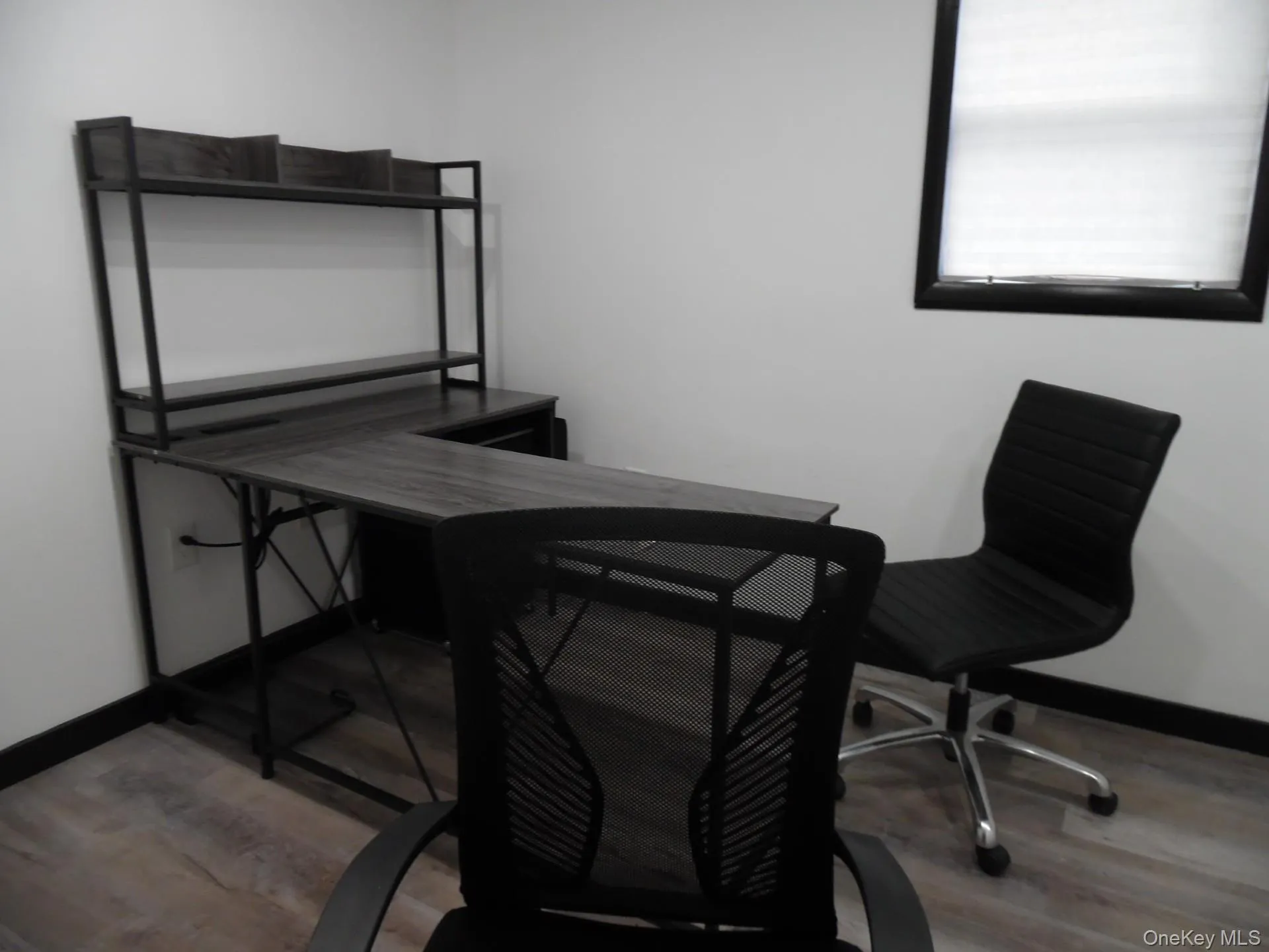 Office featuring light wood-style floors Office featuring light wood-style floors