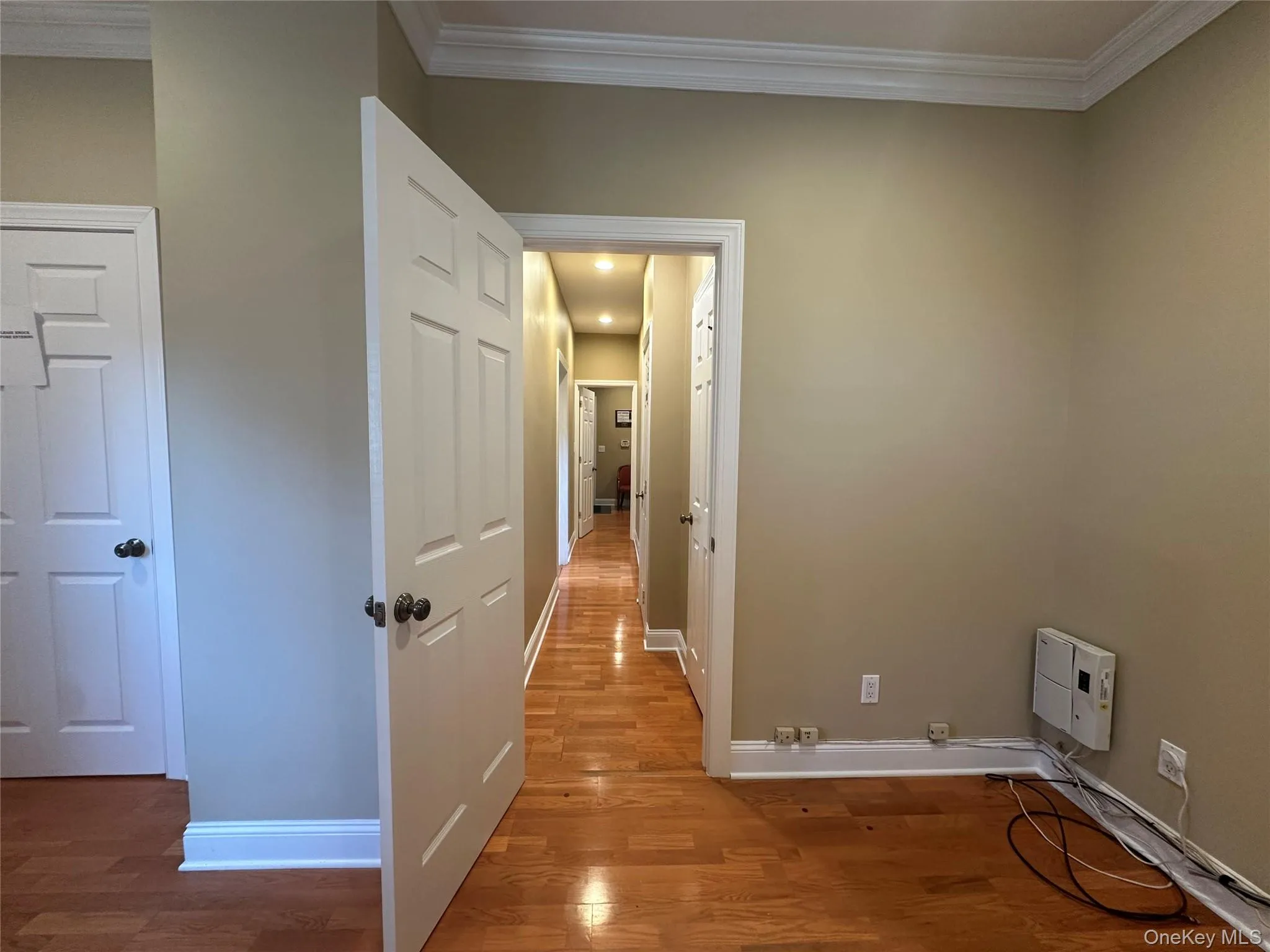 Corridor to rear office from waiting room Corridor to rear office from waiting room