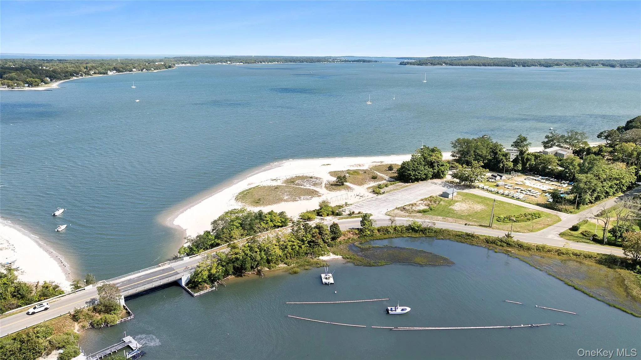 Aerial overview of property's location with a large body of water Aerial overview of property's location with a large body of water