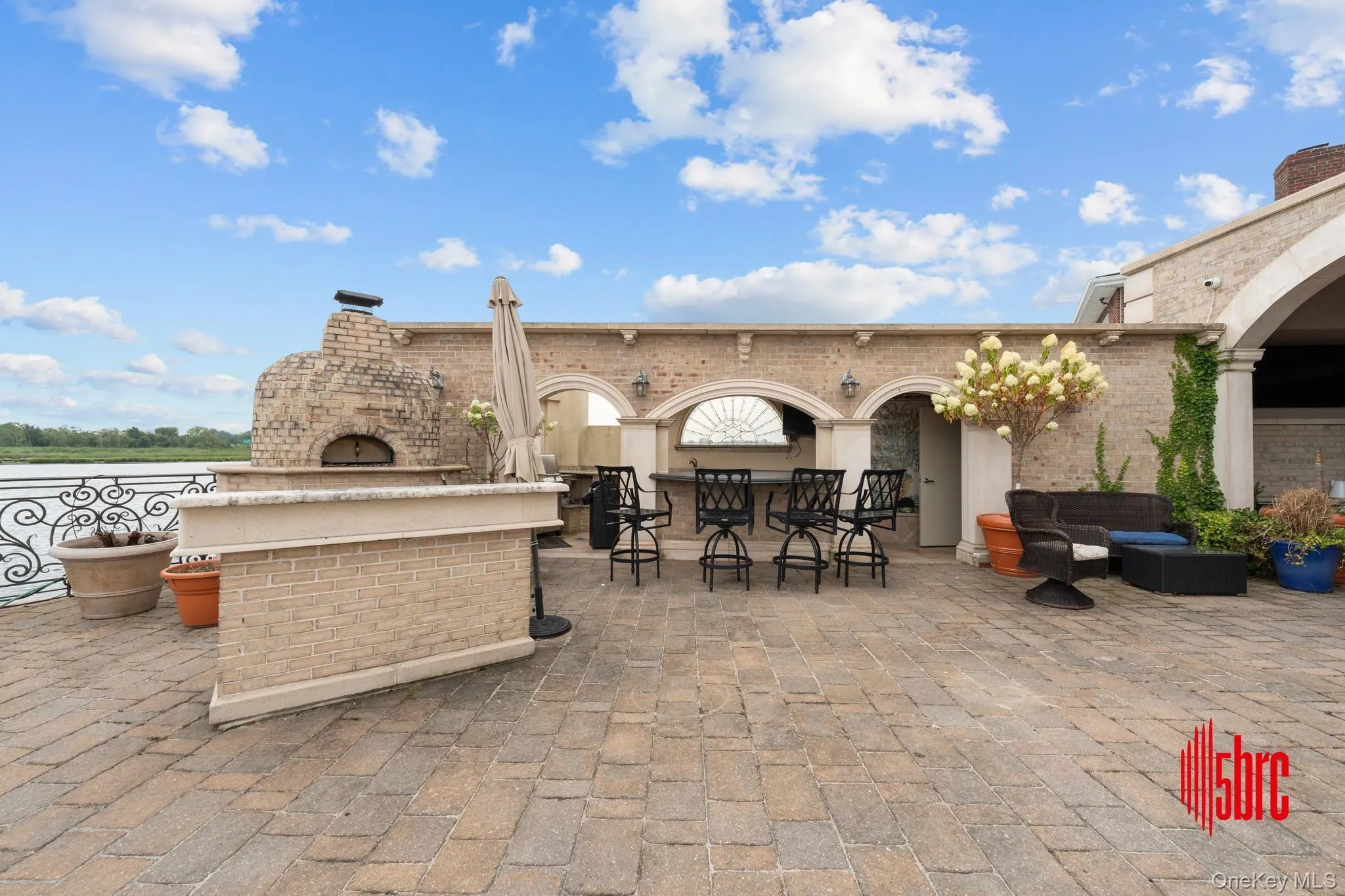 View of patio / terrace with a fireplace View of patio / terrace with a fireplace