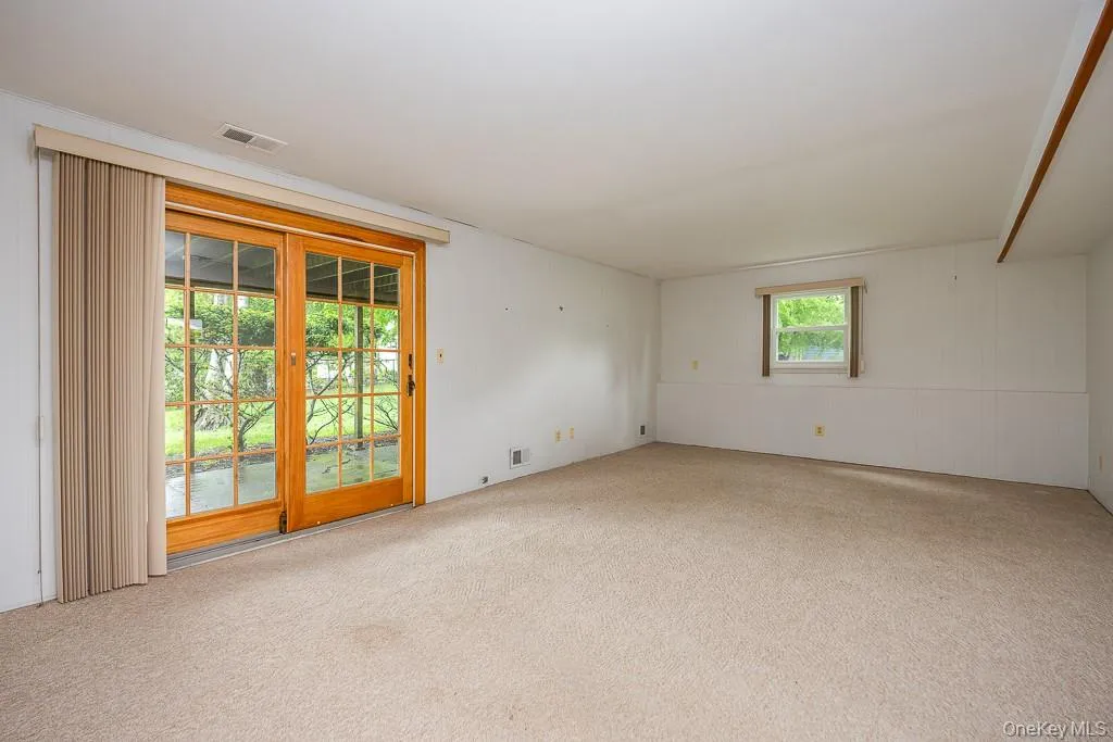 View of carpeted spare room View of carpeted spare room