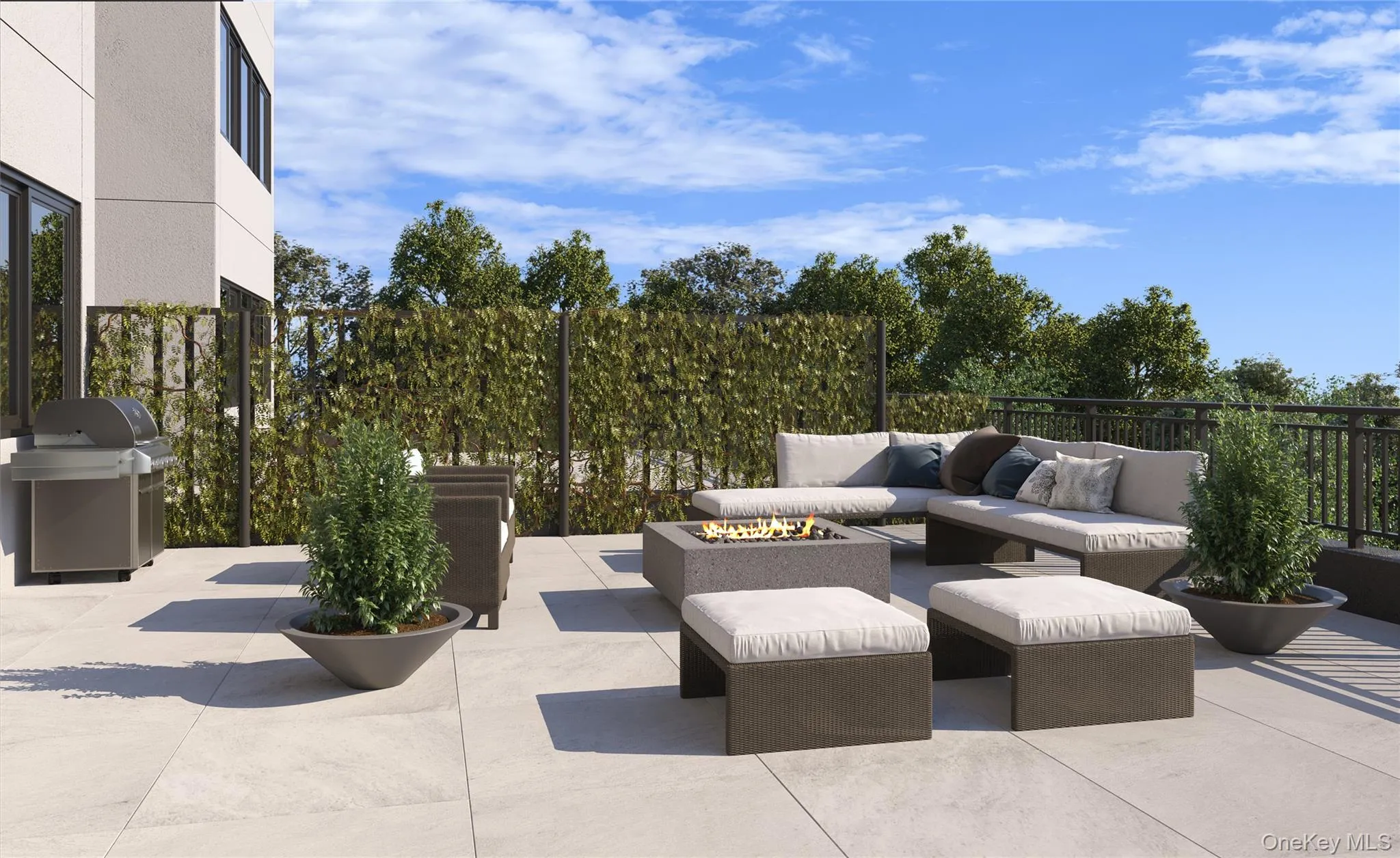 View of patio / terrace featuring an outdoor living space with a fire pit and a grill View of patio / terrace featuring an outdoor living space with a fire pit and a grill