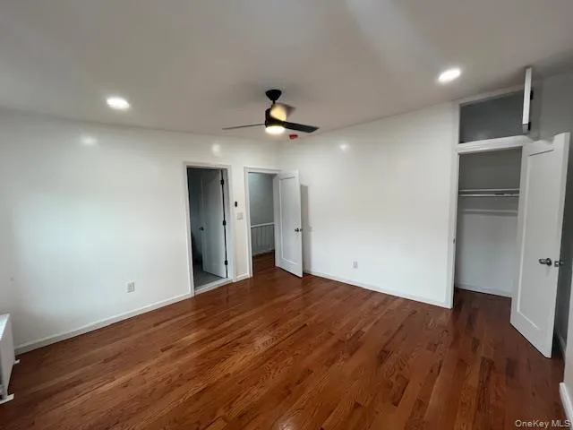 Unfurnished bedroom featuring dark wood-style floors, recessed lighting, and a ceiling fan Unfurnished bedroom featuring dark wood-style floors, recessed lighting, and a ceiling fan