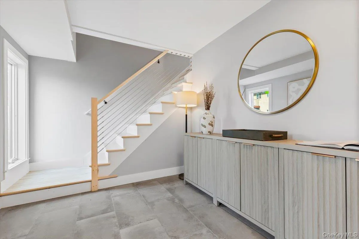 Welcoming entry foyer with sleek finishes and contemporary design. Welcoming entry foyer with sleek finishes and contemporary design.