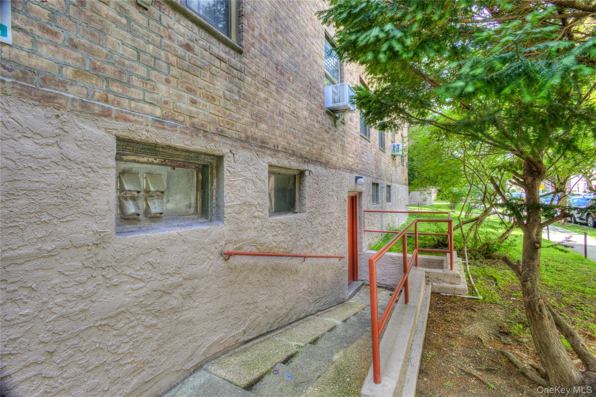 View of home's exterior featuring brick siding View of home's exterior featuring brick siding