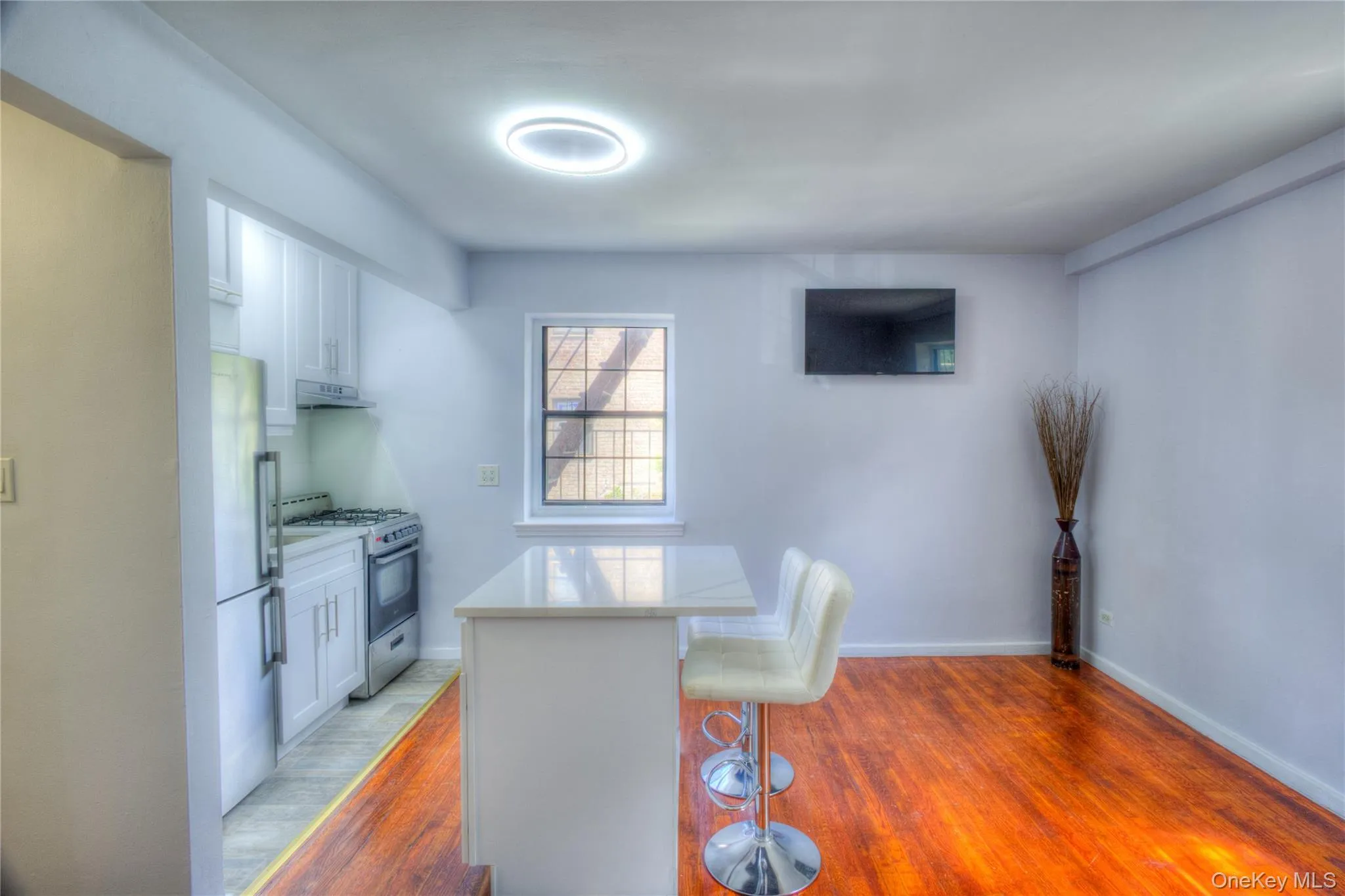 Dining area with wood finished floors and baseboards Dining area with wood finished floors and baseboards