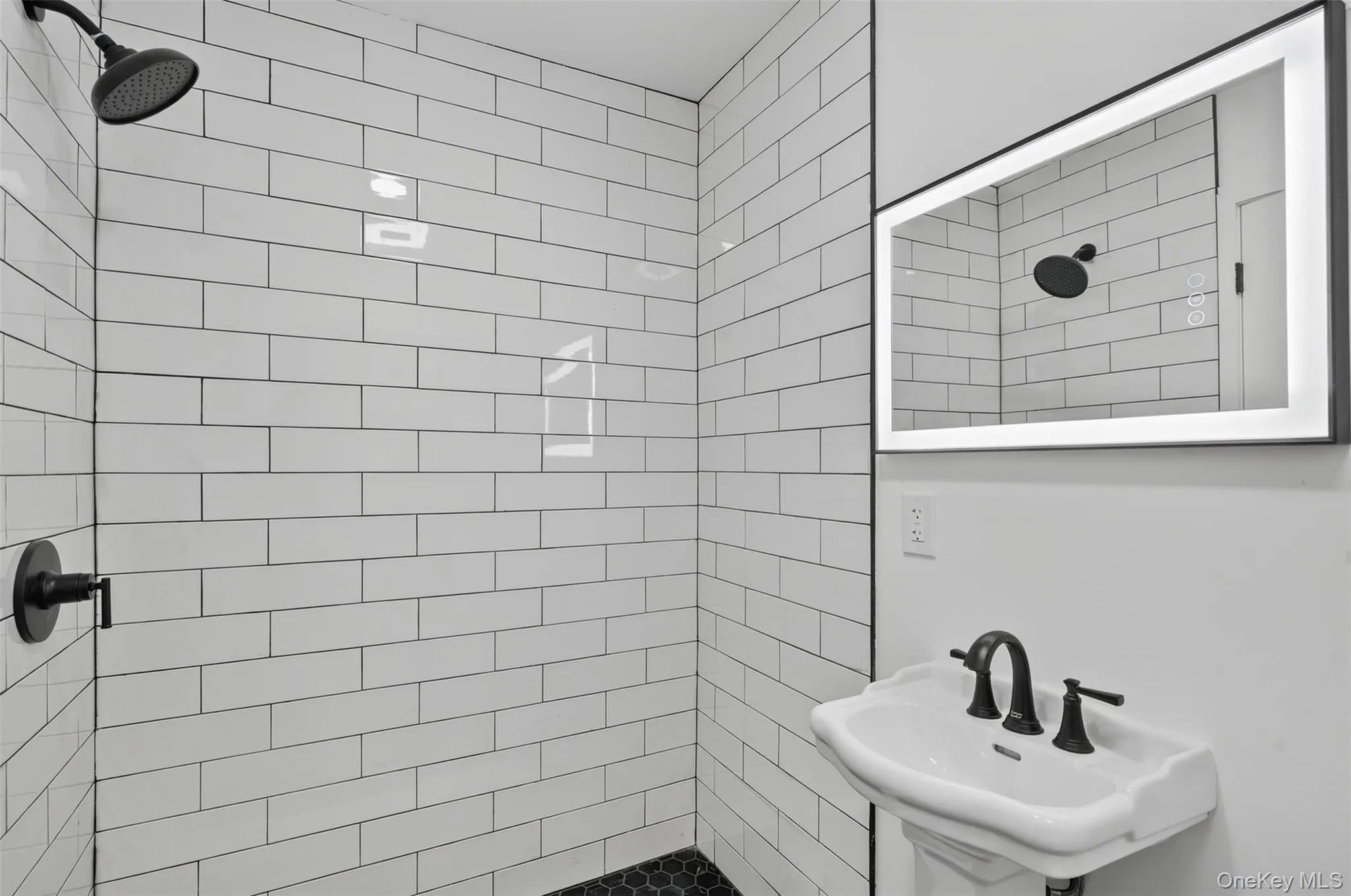 Full bathroom with a stall shower Full bathroom with a stall shower