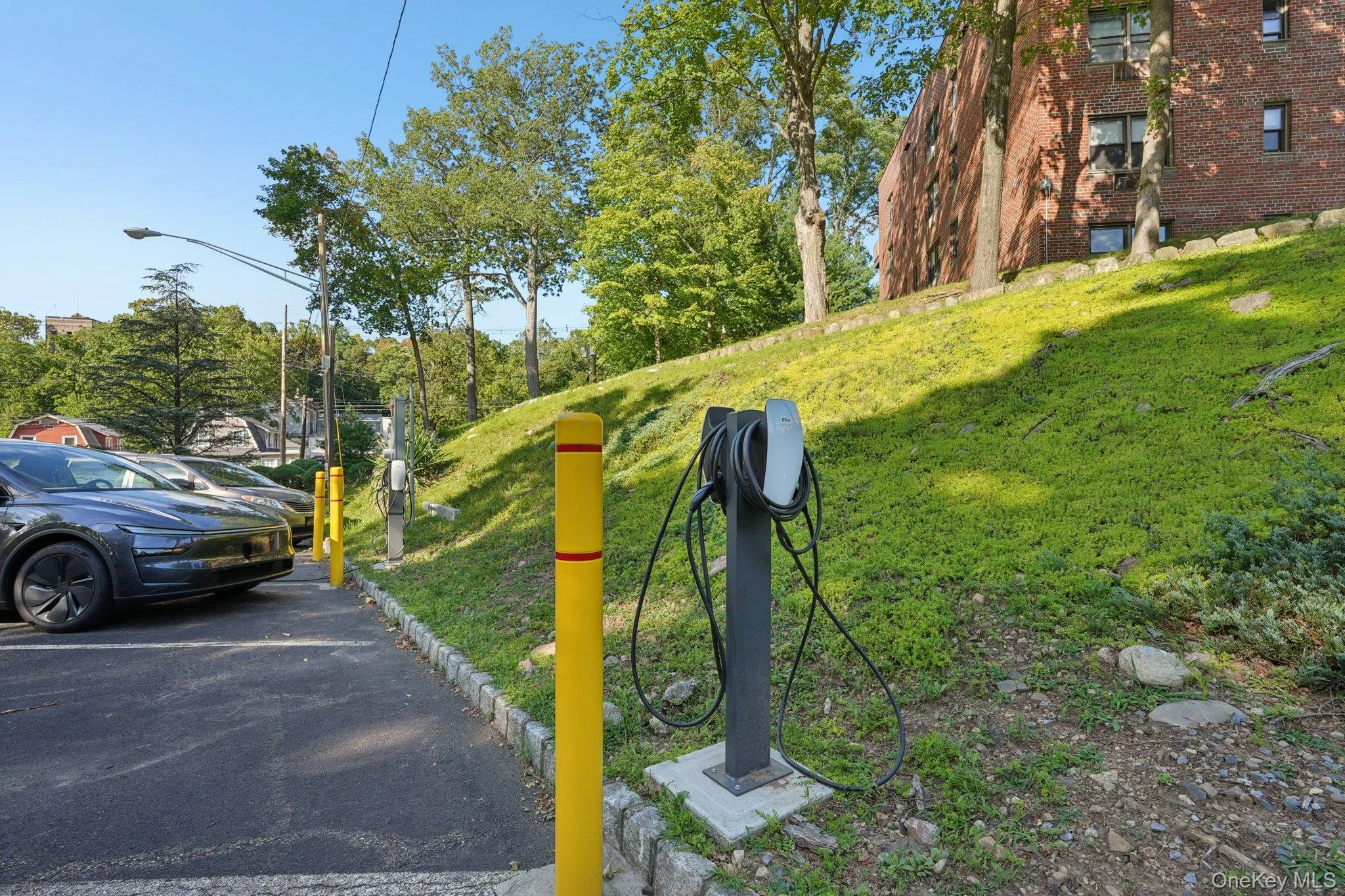 Exterior view of parking and electric vehicle charger Exterior view of parking and electric vehicle charger
