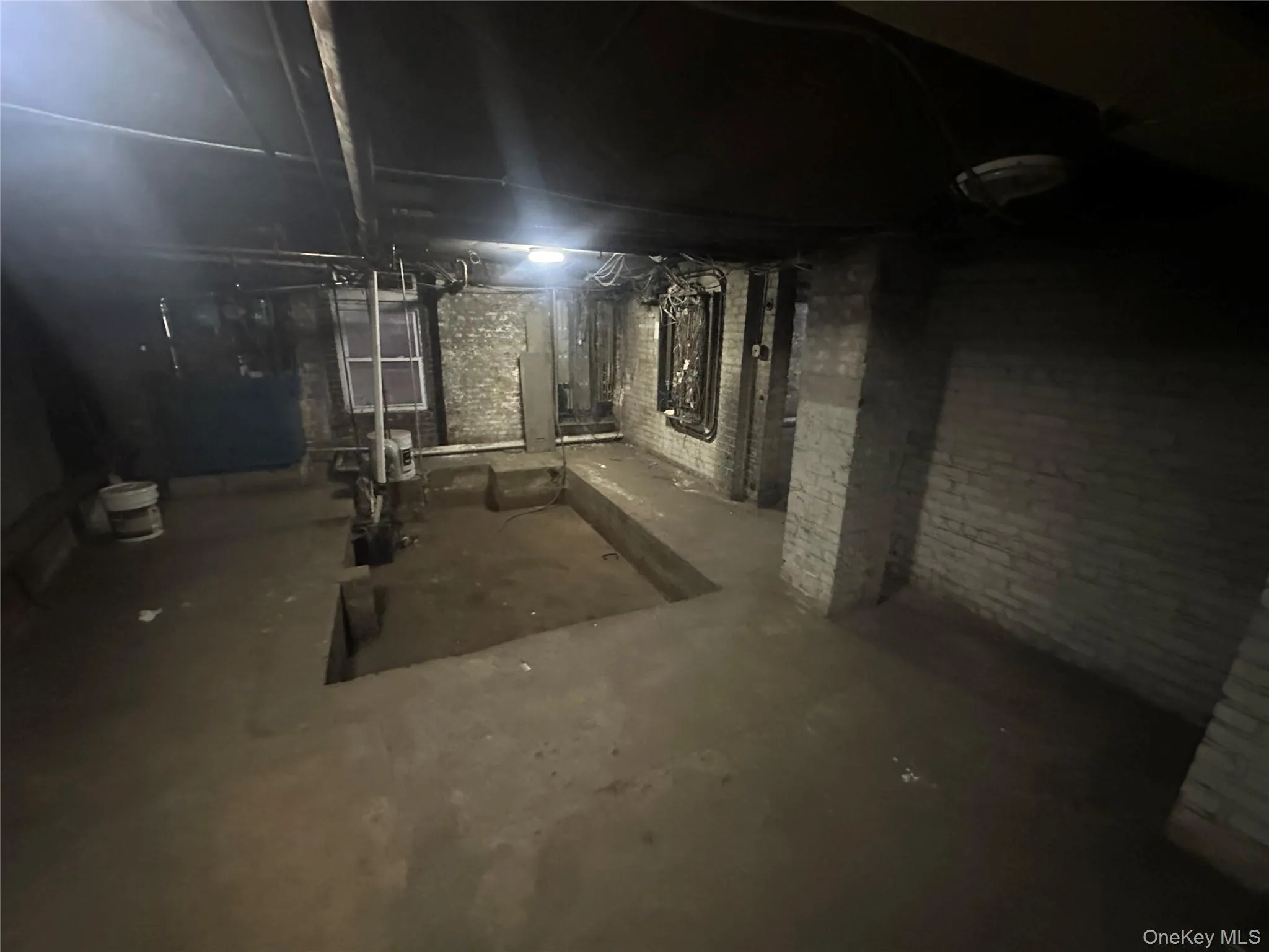 View of unfinished below grade area View of unfinished below grade area