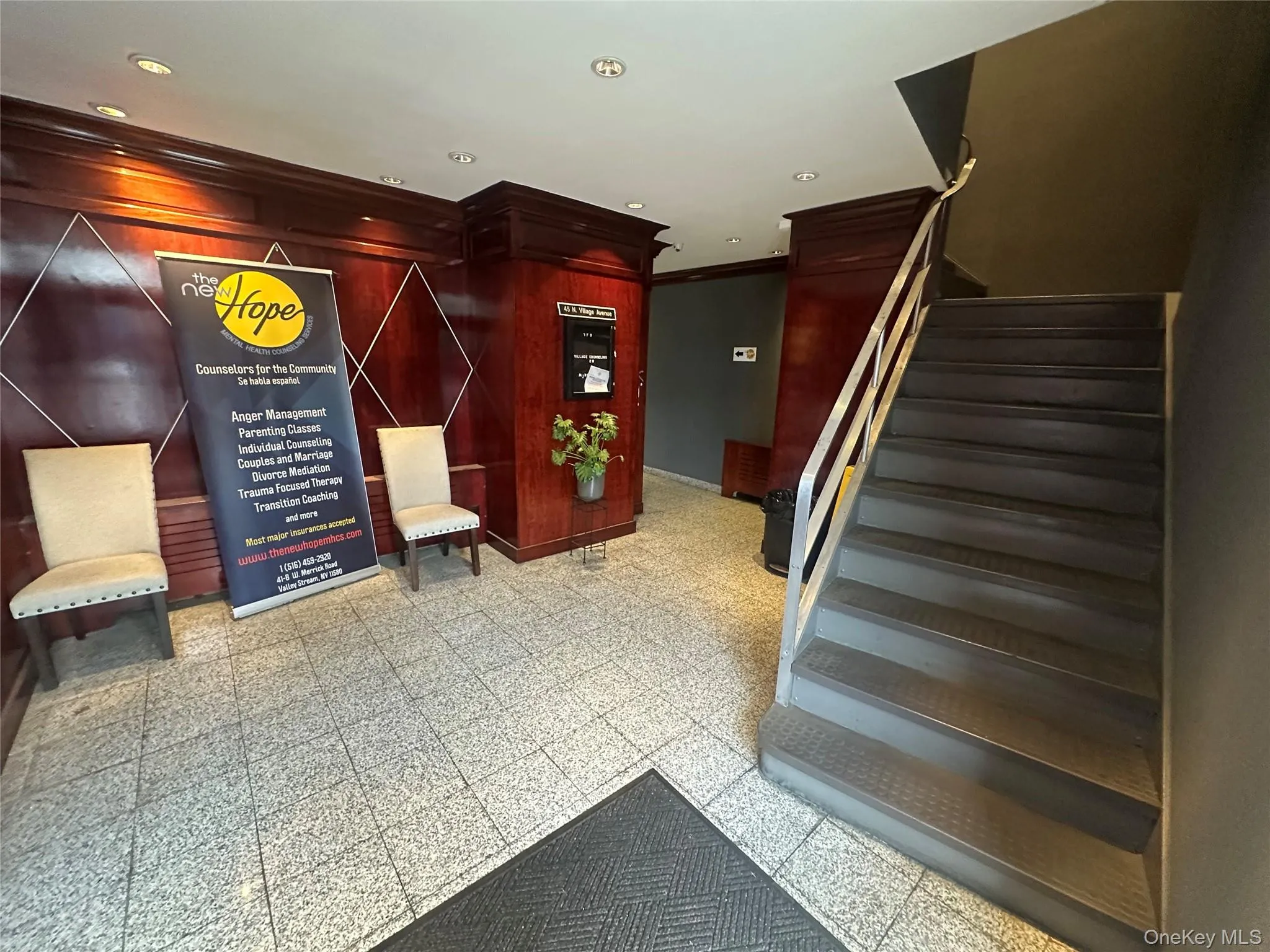 Lobby featuring stairway, recessed lighting, and crown molding Lobby featuring stairway, recessed lighting, and crown molding