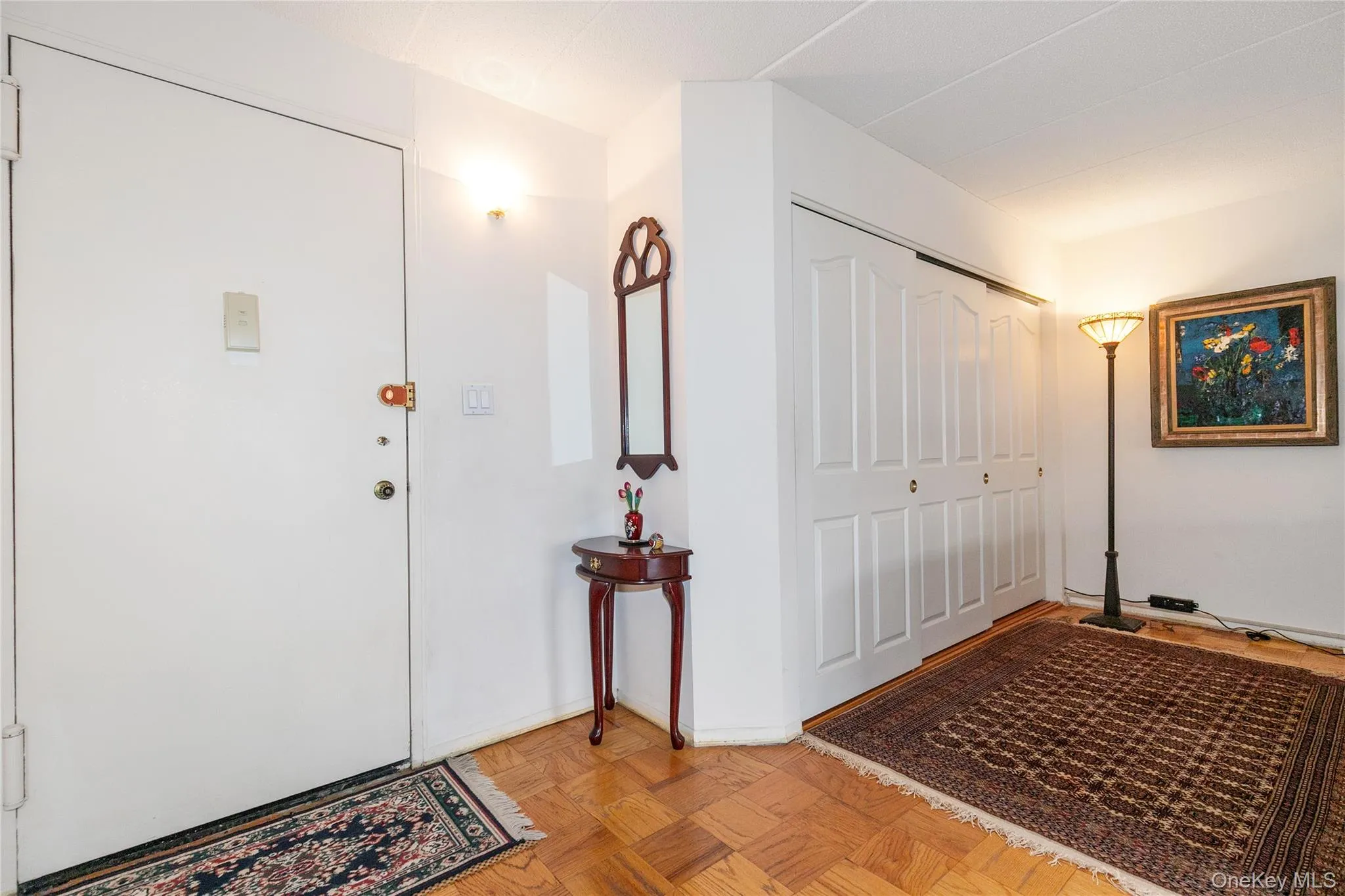 Entrance foyer featuring Wall-to-Wall Closet in back of Living Room Entrance foyer featuring Wall-to-Wall Closet in back of Living Room
