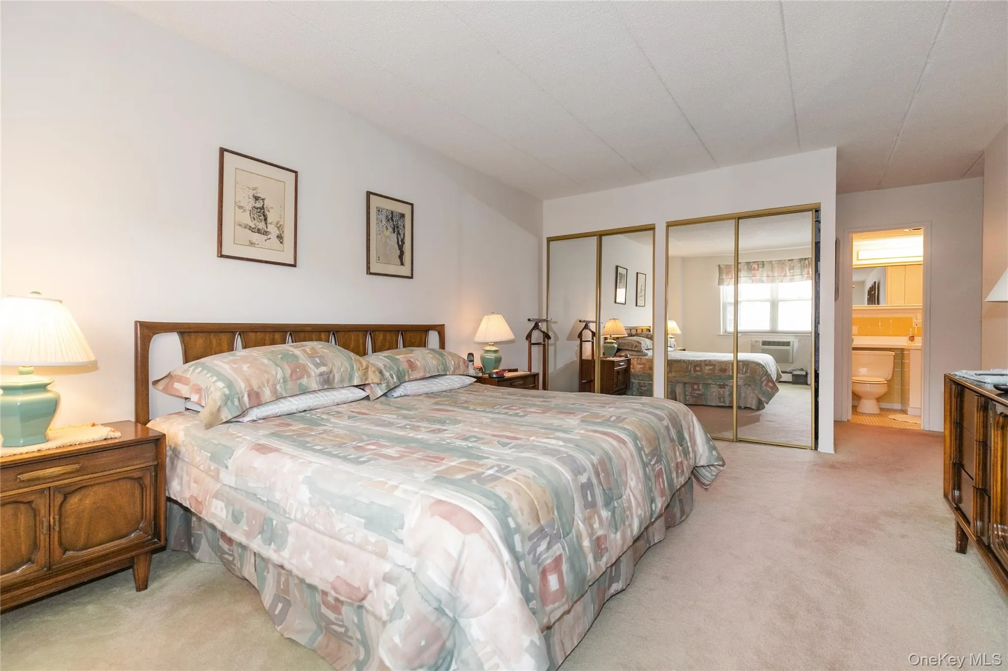 Bedroom with multiple closets, and ensuite bathroom Bedroom with multiple closets, and ensuite bathroom