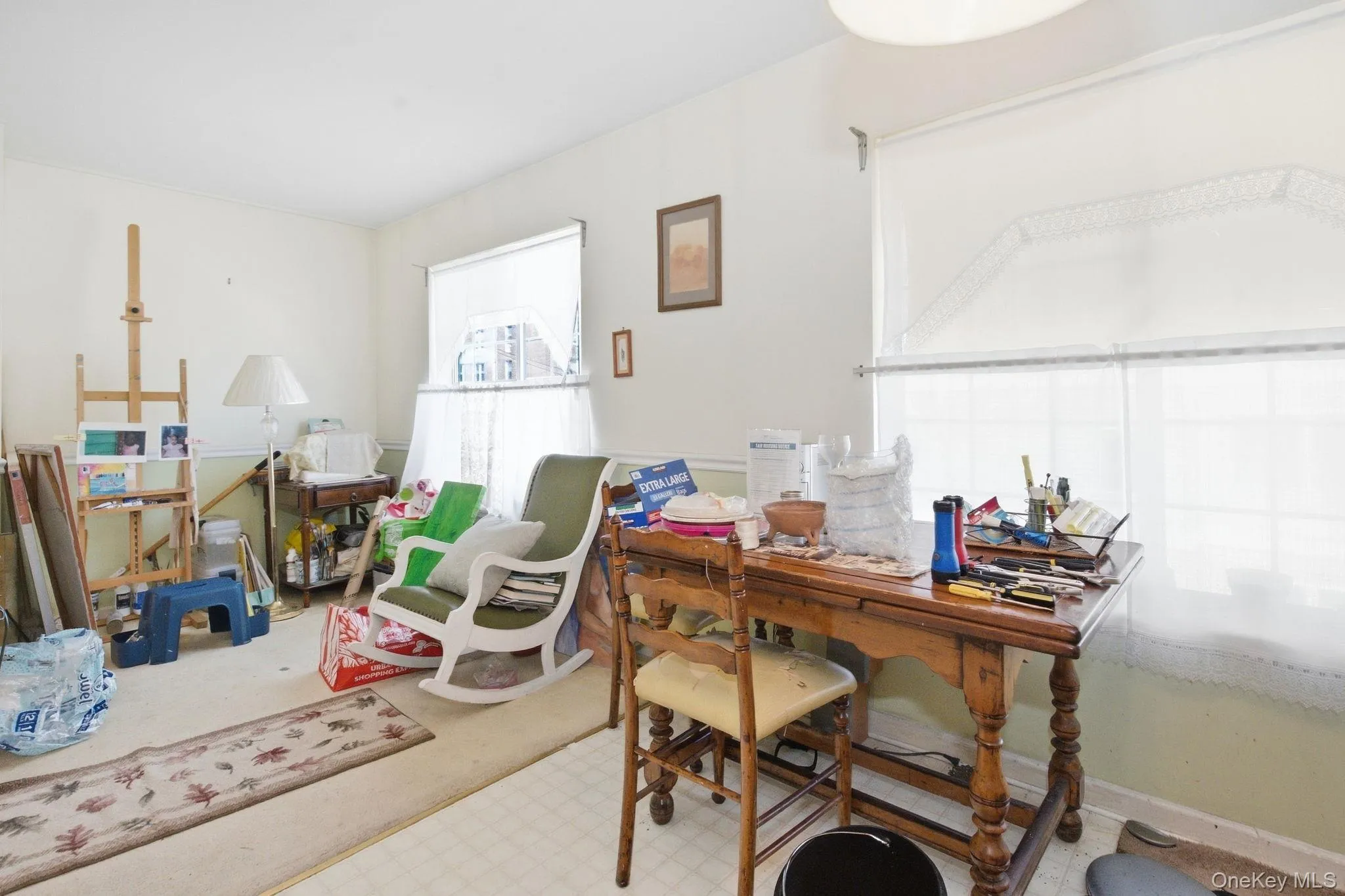 Two windows brighten this flexible space off the kitchen, sized for kitchen table, a reading nook, or studio. Two windows brighten this flexible space off the kitchen, sized for kitchen table, a reading nook, or studio.