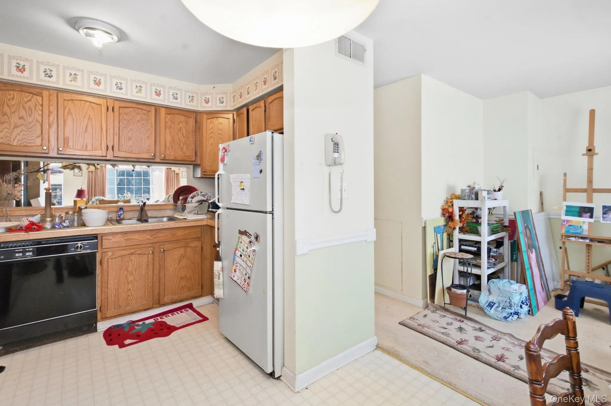The kitchen opens to the family room, a flexible space for a den, office or creative studio. The kitchen opens to the family room, a flexible space for a den, office or creative studio.