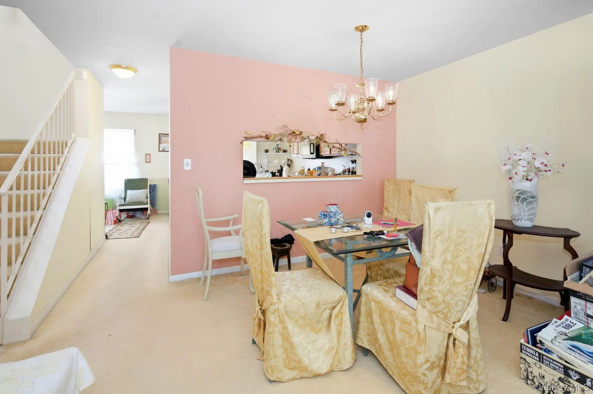 The dining room connects to the kitchen through an open pass-through, easy for serving and conversation. The dining room connects to the kitchen through an open pass-through, easy for serving and conversation.