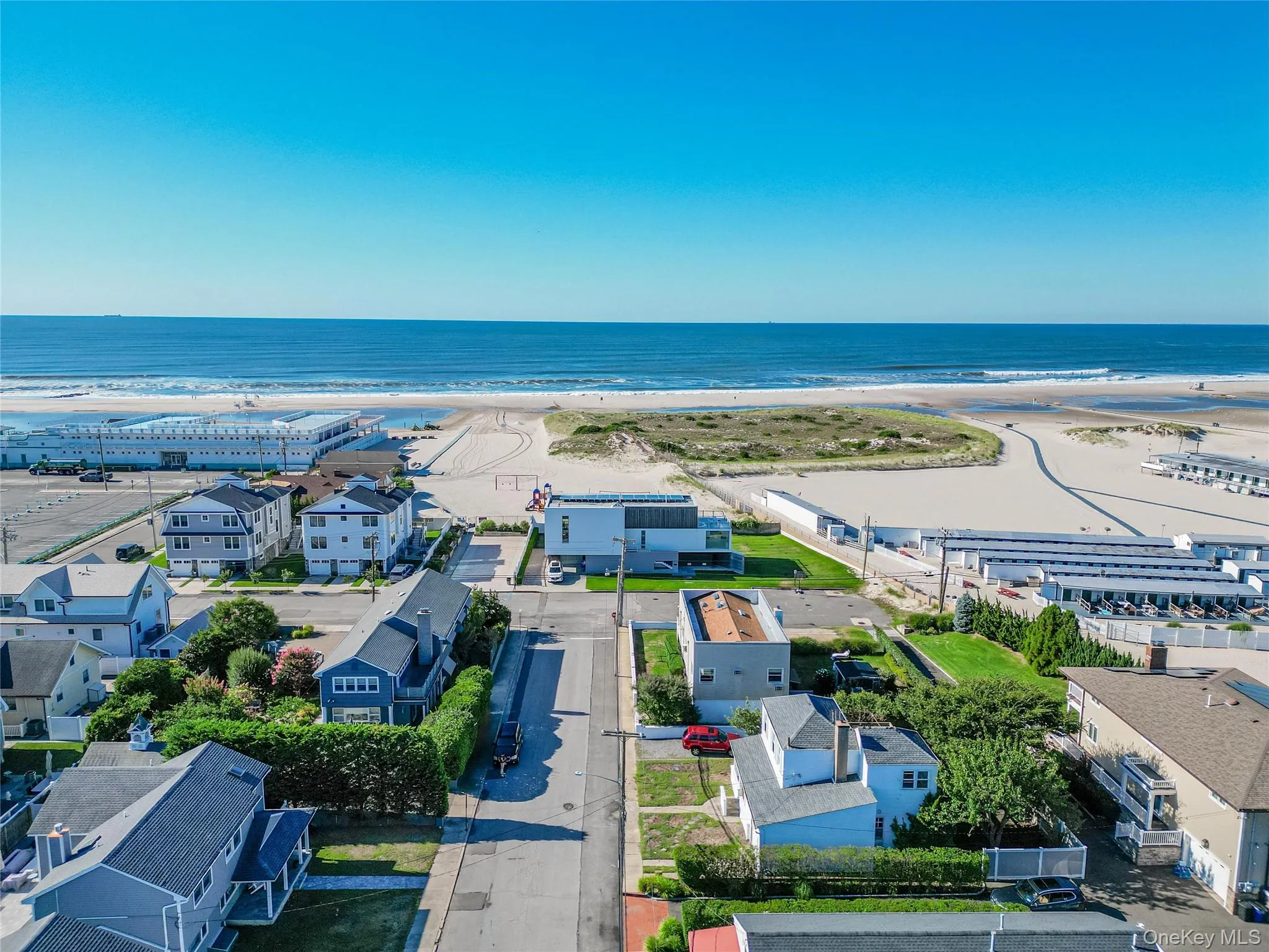 Aerial view of waterfront with a beach Aerial view of waterfront with a beach