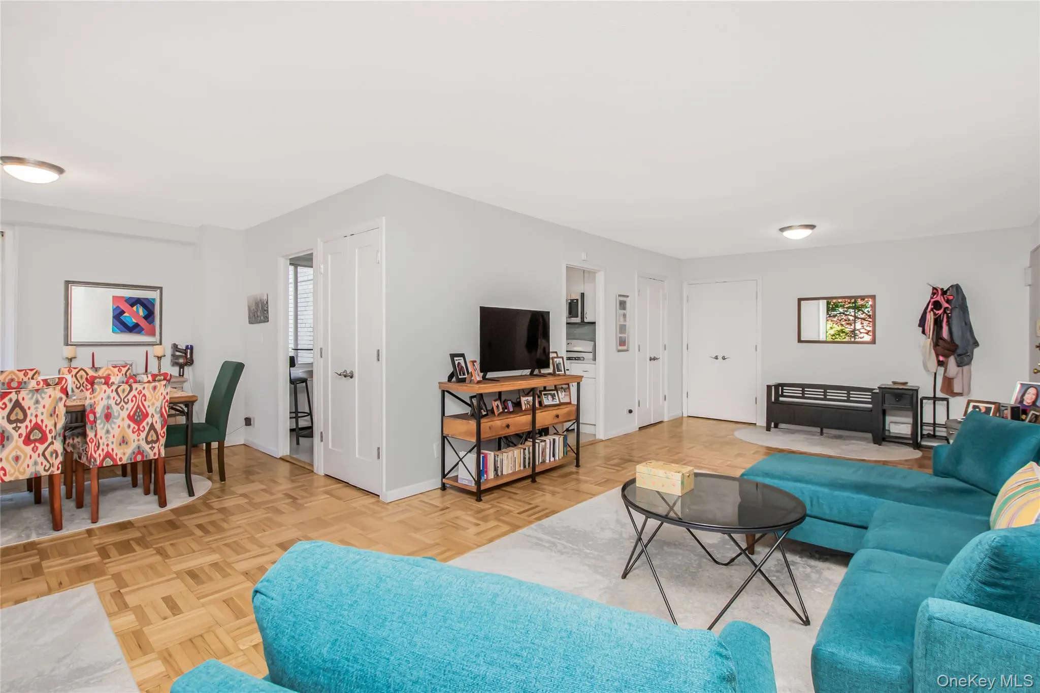 Living area featuring baseboards Living area featuring baseboards
