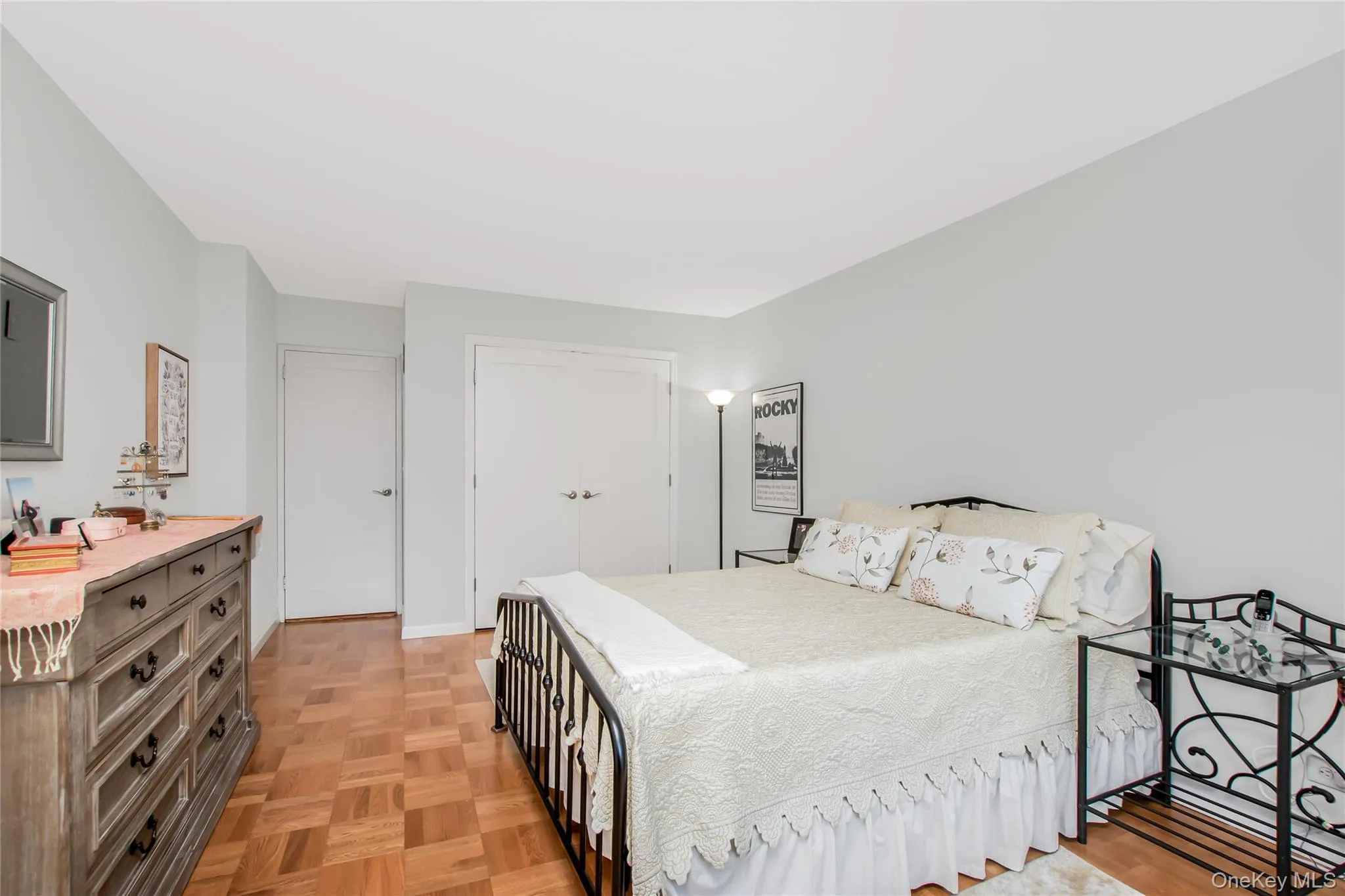 Bedroom with a closet and baseboards Bedroom with a closet and baseboards