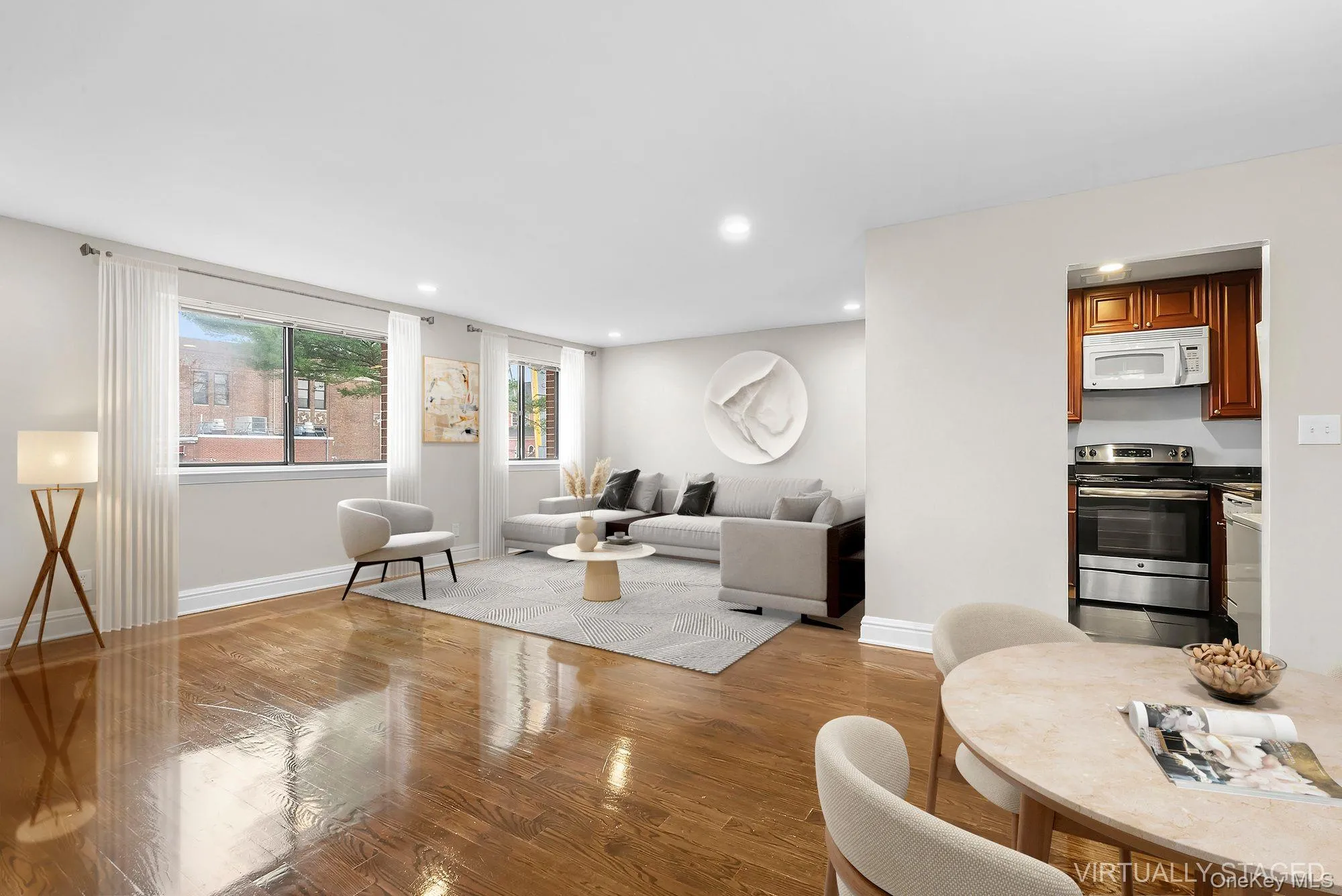 Living room featuring recessed lighting and light wood finished floors Living room featuring recessed lighting and light wood finished floors