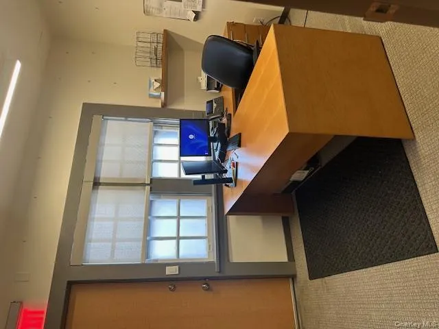 Office space with plenty of natural light, rear entrance. Office space with plenty of natural light, rear entrance.