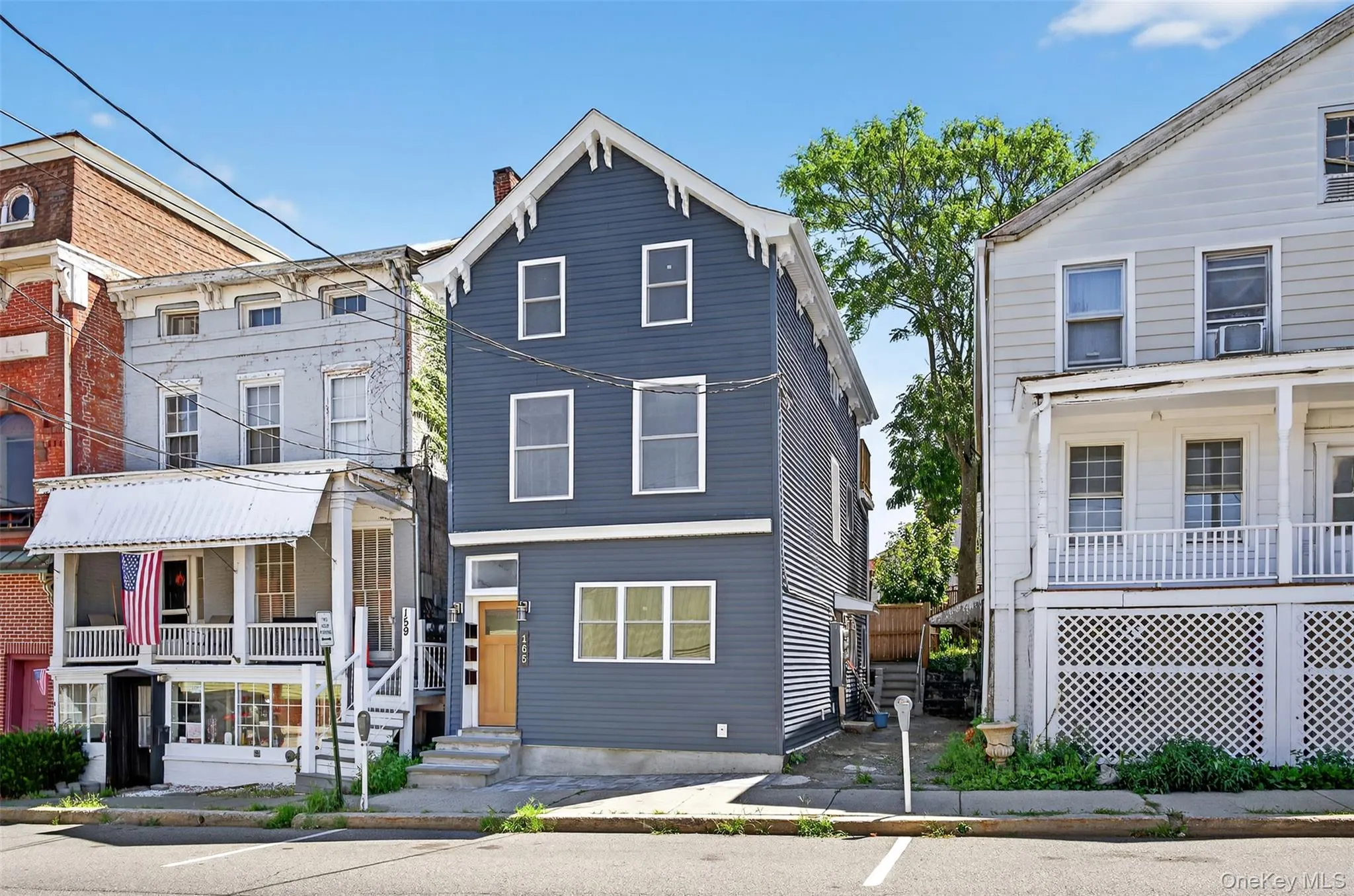 View of front of property with a chimney View of front of property with a chimney