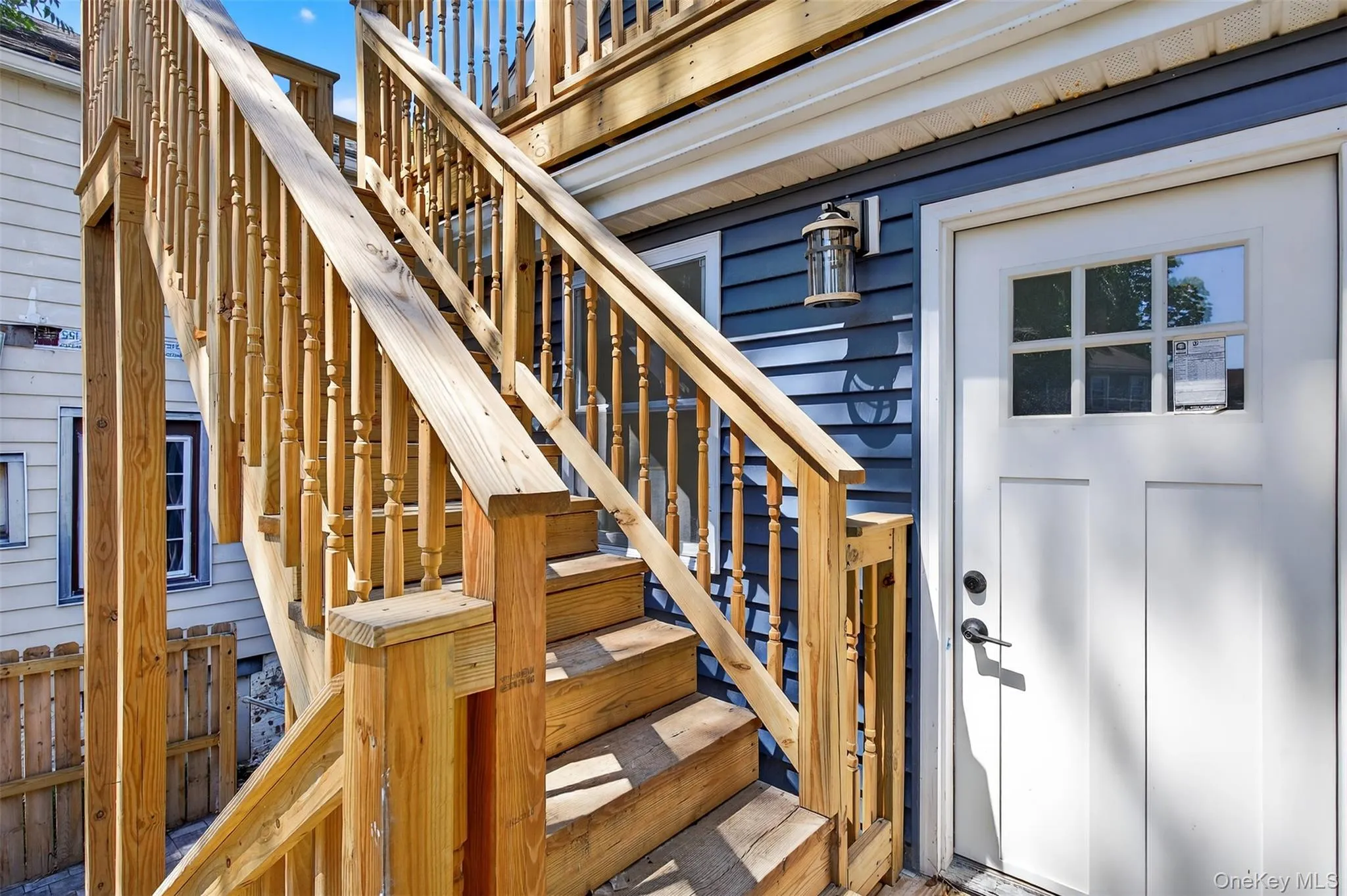 Doorway to property with a wooden deck Doorway to property with a wooden deck