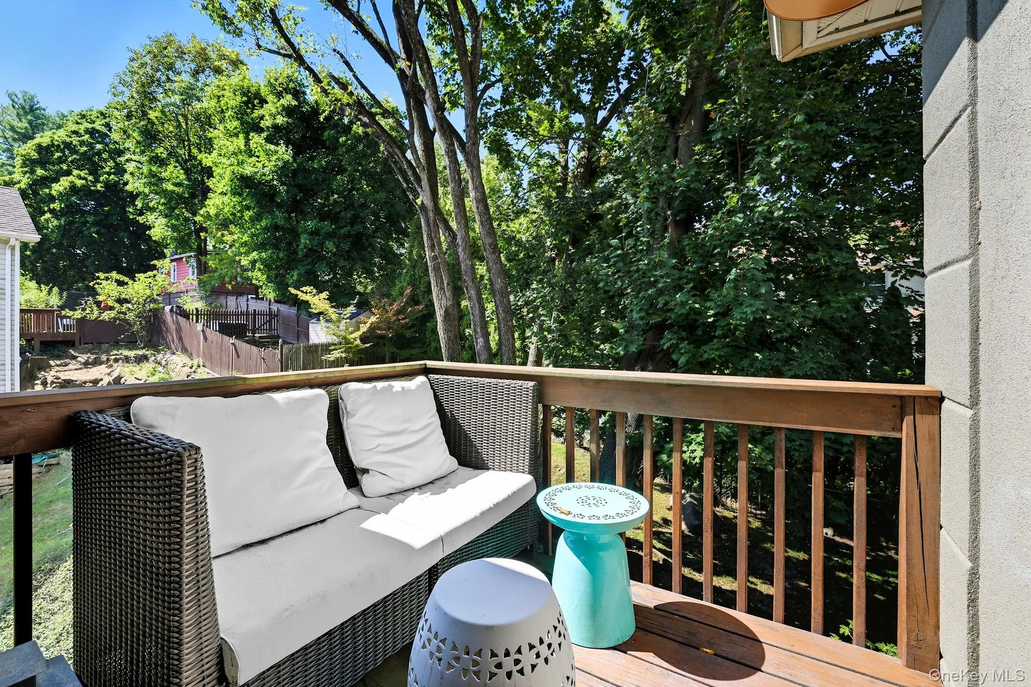 Deck off of the kitchen that overlooks the garden area Deck off of the kitchen that overlooks the garden area