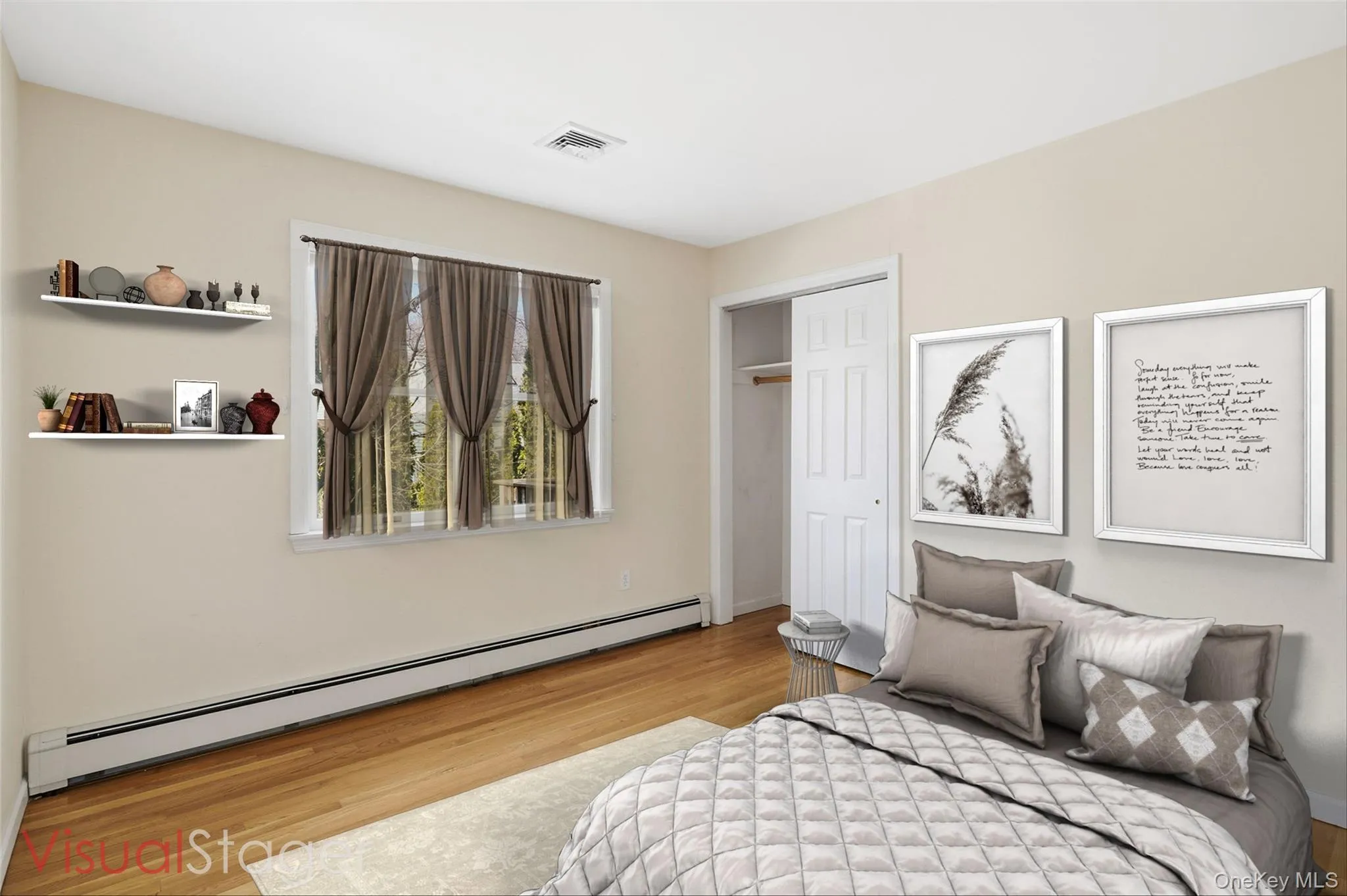 Bedroom with hardwood floors and a double closet Bedroom with hardwood floors and a double closet