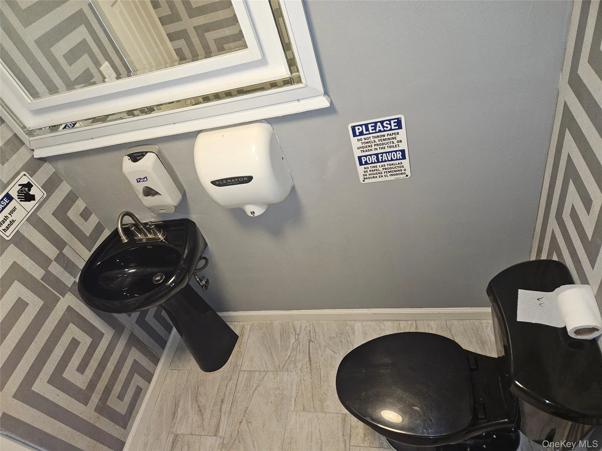 Bathroom with baseboards Bathroom with baseboards