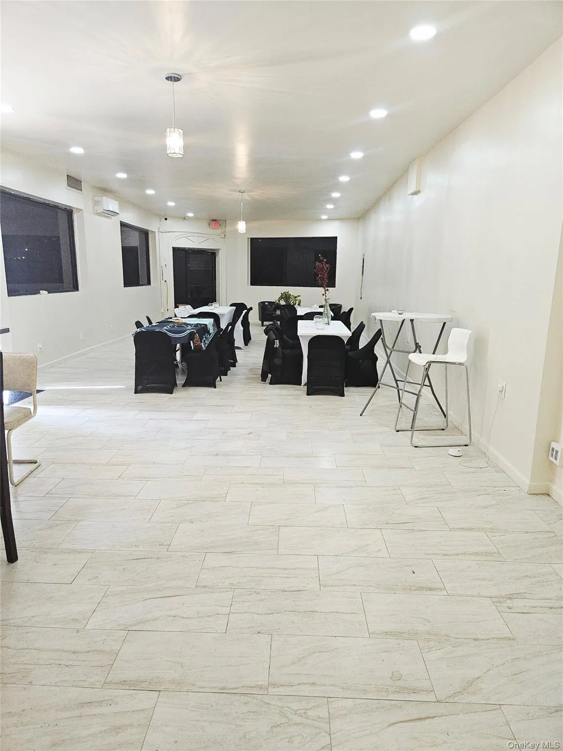 Living area featuring recessed lighting and light wood-type flooring Living area featuring recessed lighting and light wood-type flooring