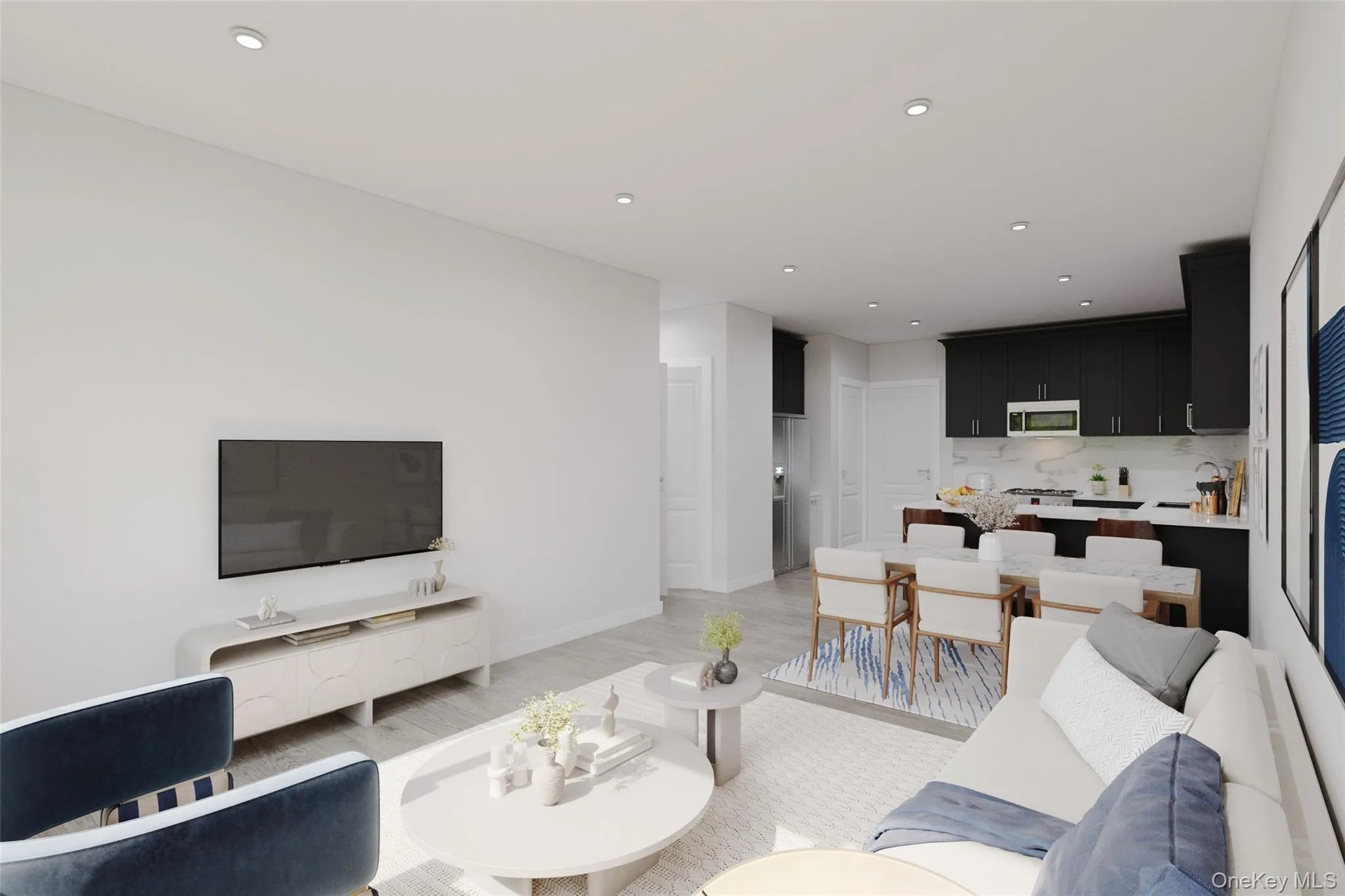 Living area featuring light wood finished floors and recessed lighting Living area featuring light wood finished floors and recessed lighting