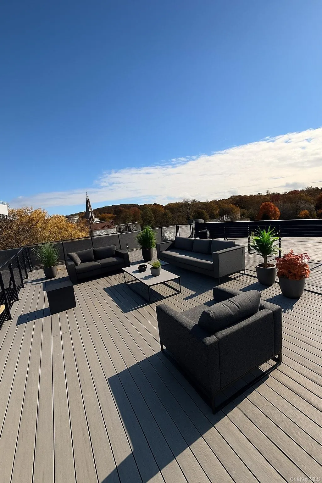 Wooden terrace with outdoor lounge area Wooden terrace with outdoor lounge area