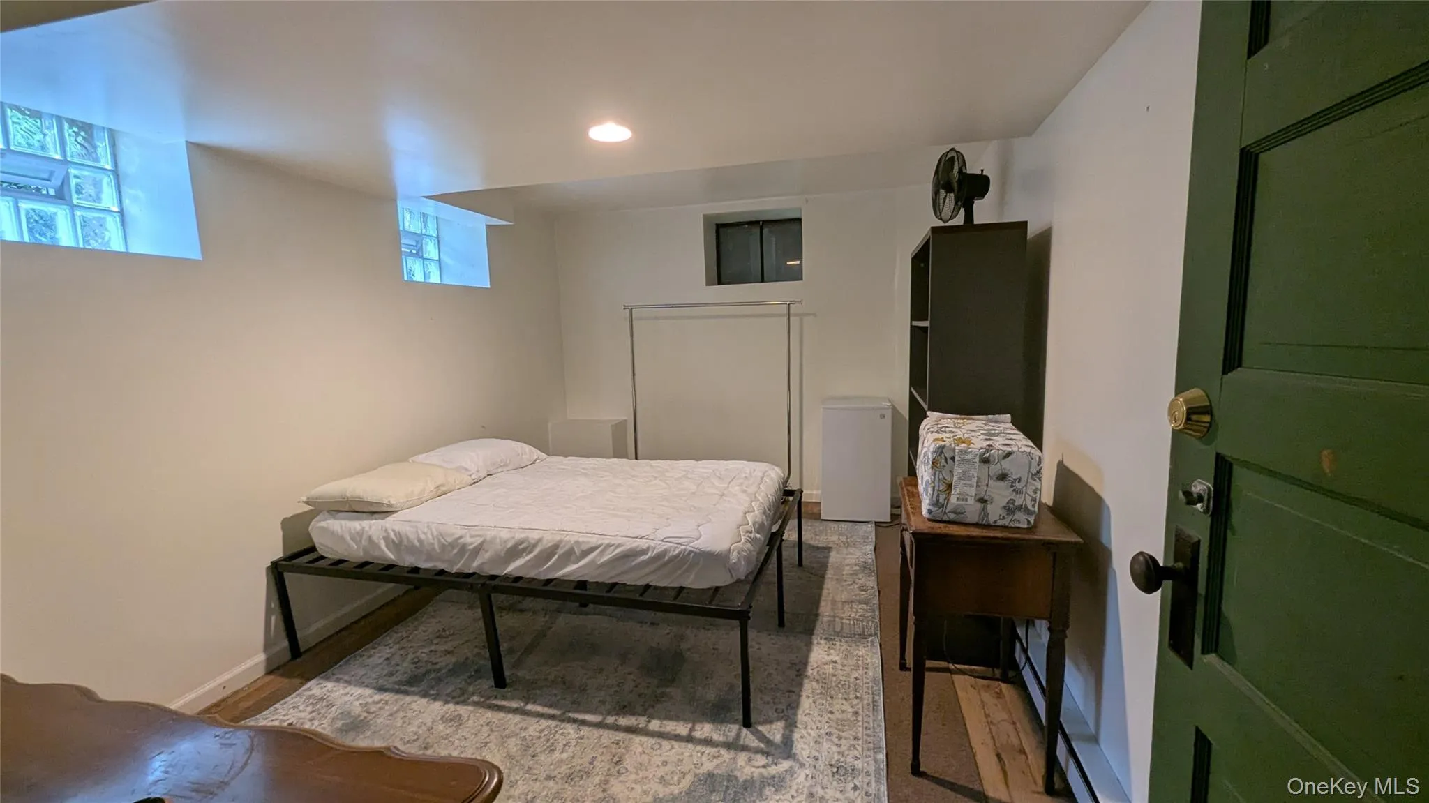 Bedroom with recessed lighting and wood finished floors Bedroom with recessed lighting and wood finished floors