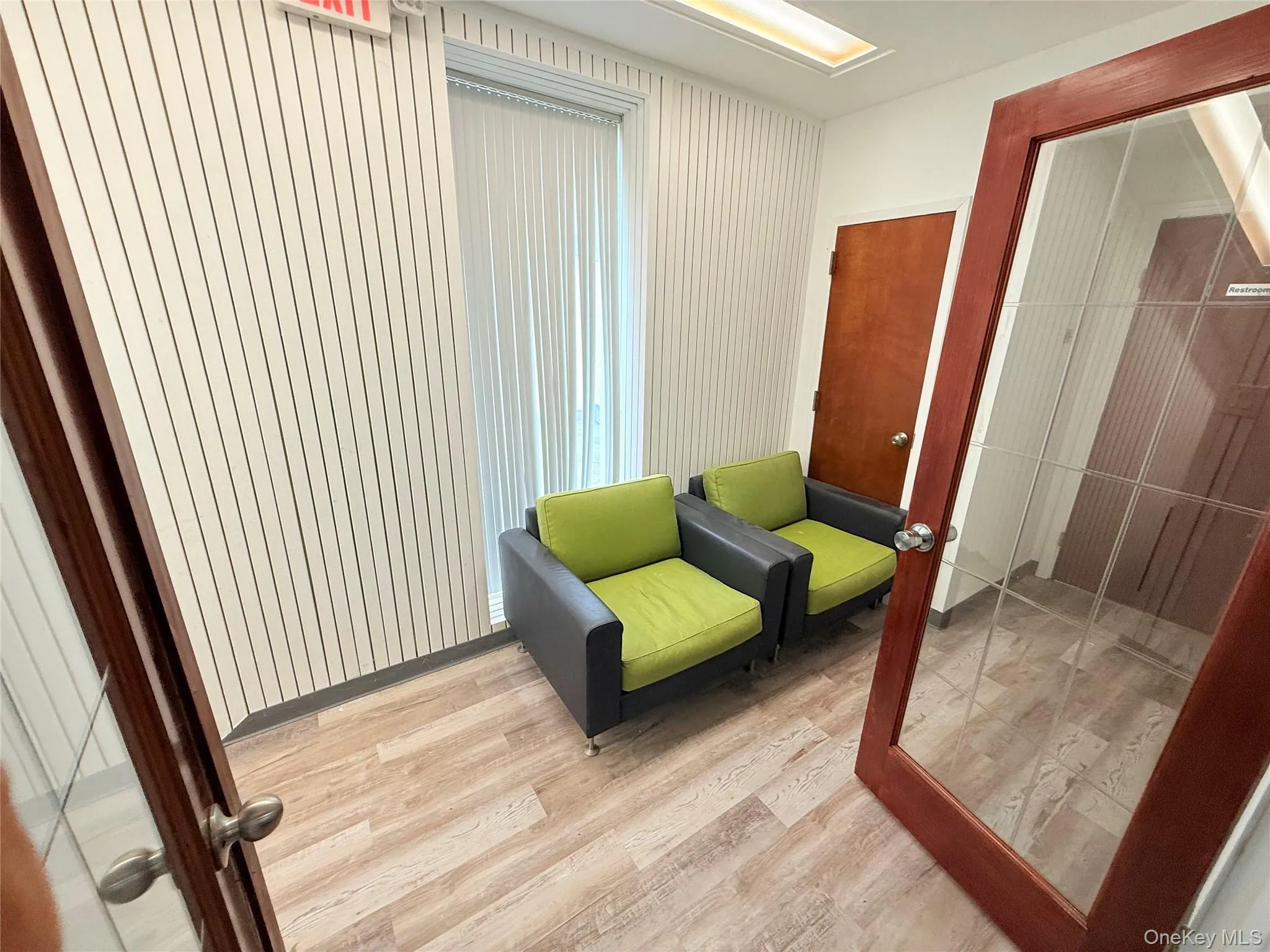 Living area with wood finished floors Living area with wood finished floors