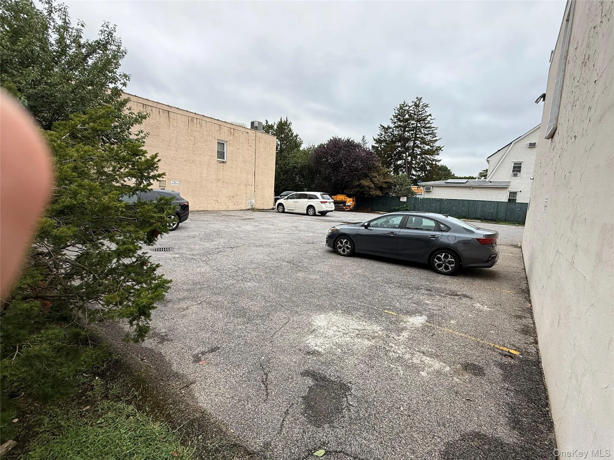 View of uncovered parking lot View of uncovered parking lot