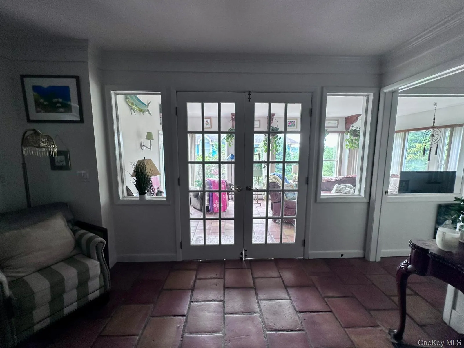 Doorway with brick floors and french doors Doorway with brick floors and french doors